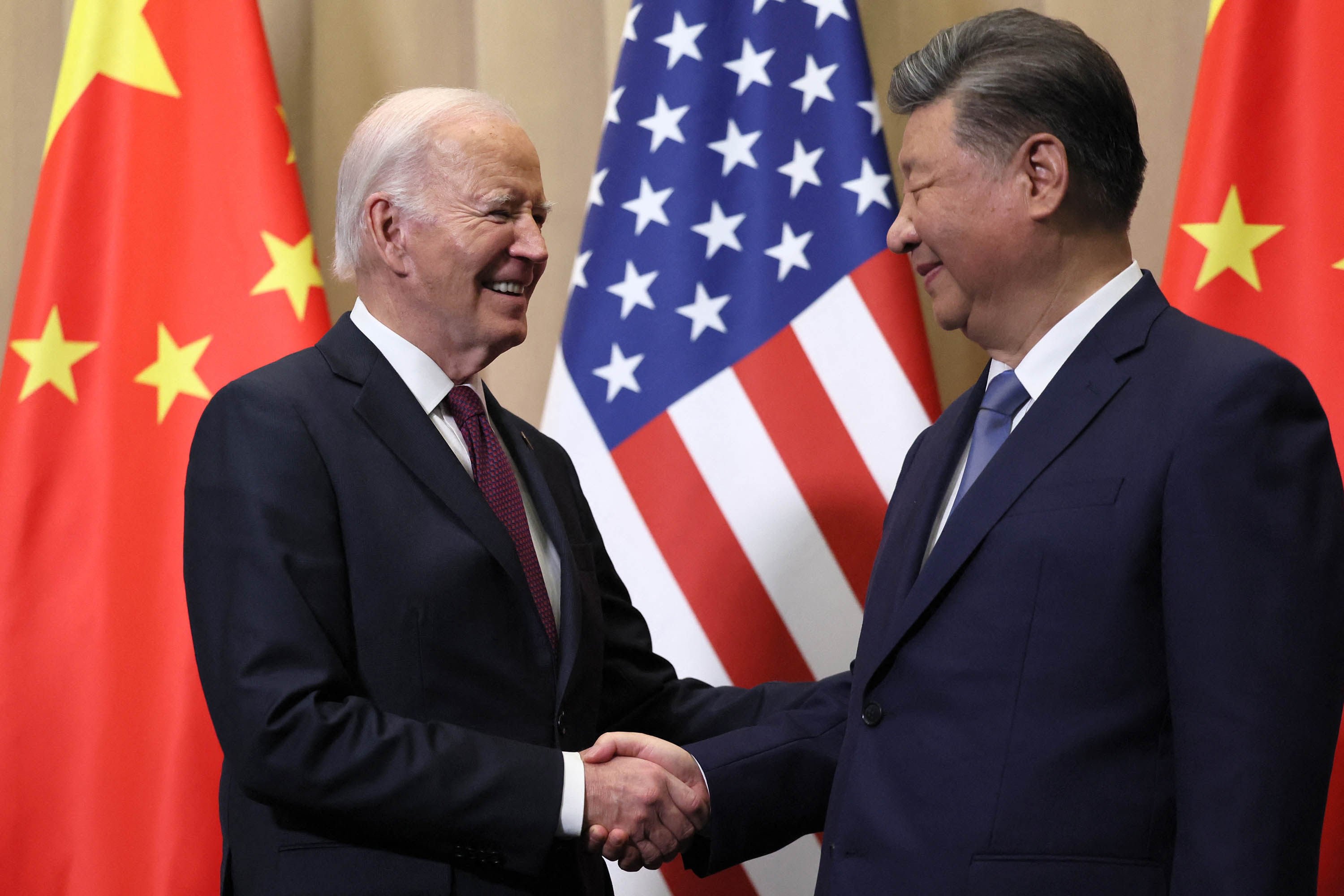 US President Joe Biden shakes hands with Chinese President Xi Jinping on the sidelines of the Asia-Pacific Economic Cooperation summit in Lima, Peru, on Saturday. Photo: AFP/Getty Images/TNS