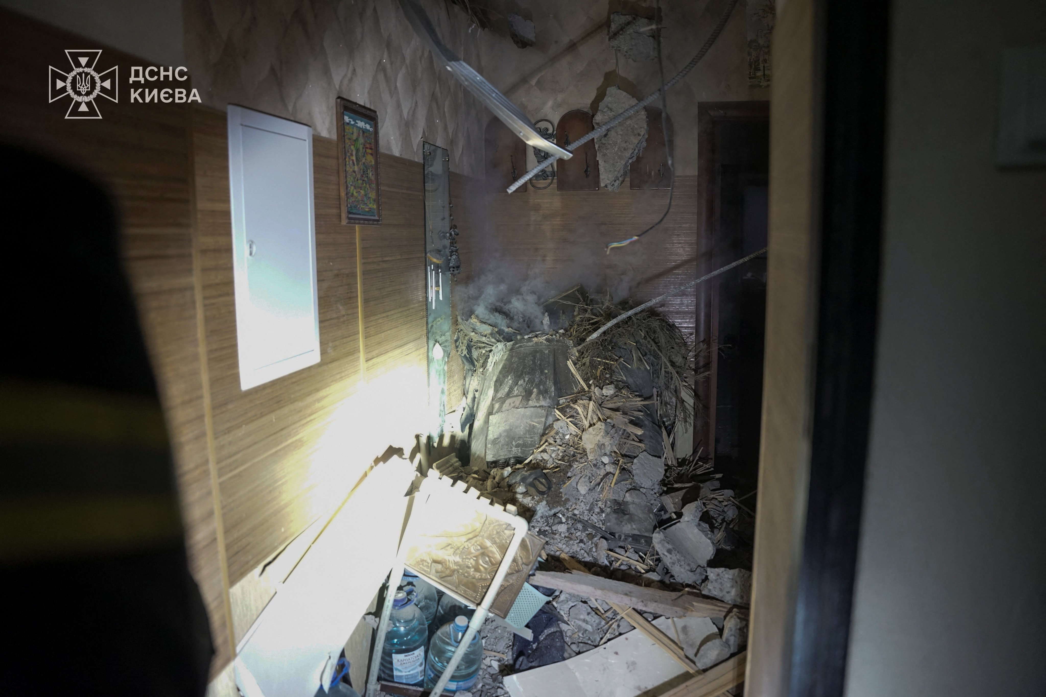 A part of a missile is seen inside of a residential apartment after a Russian missile and drone strike on Ukraine. Photo: Reuters