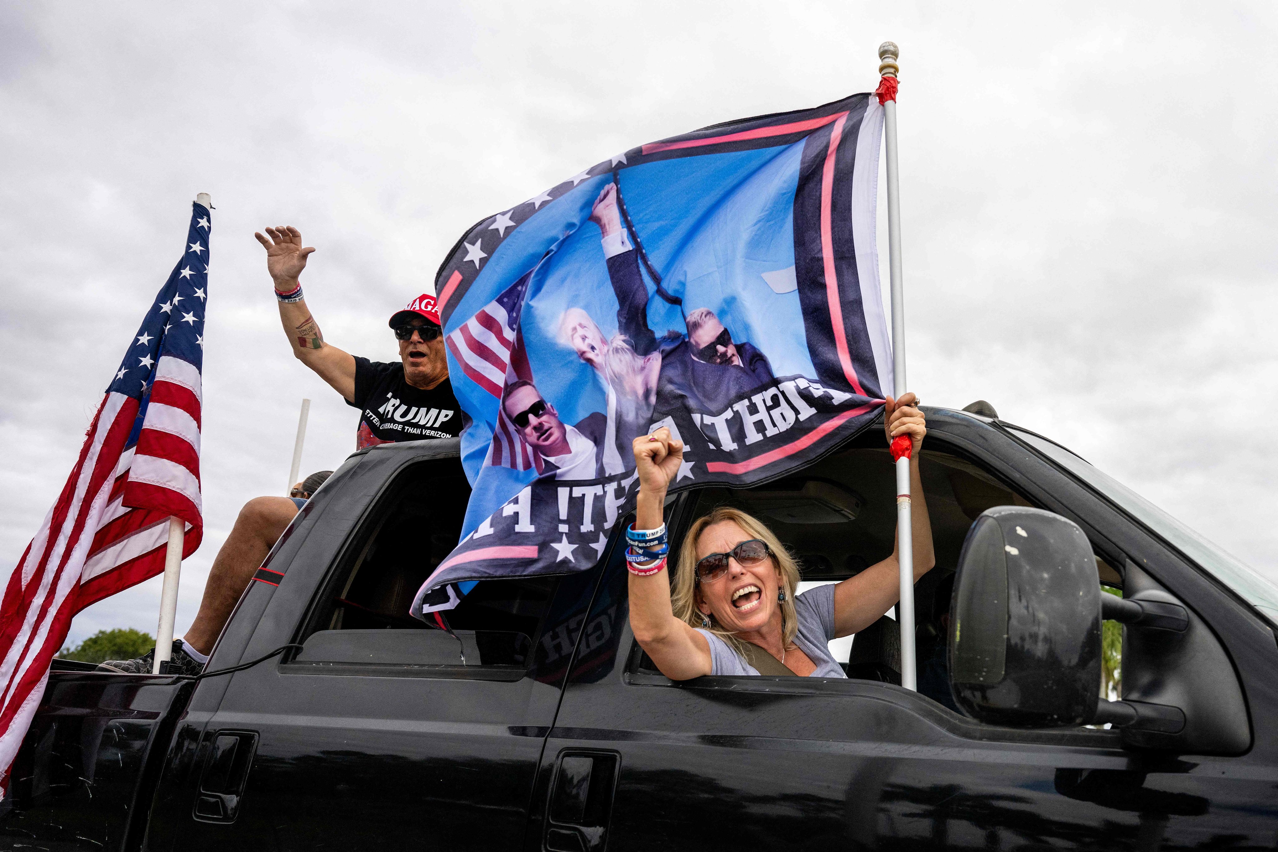 Hundreds of decorated cars and trucks with supporters of US president-elect Donald Trump participate in a victory parade in West Palm Beach, Florida. Photo: AFP