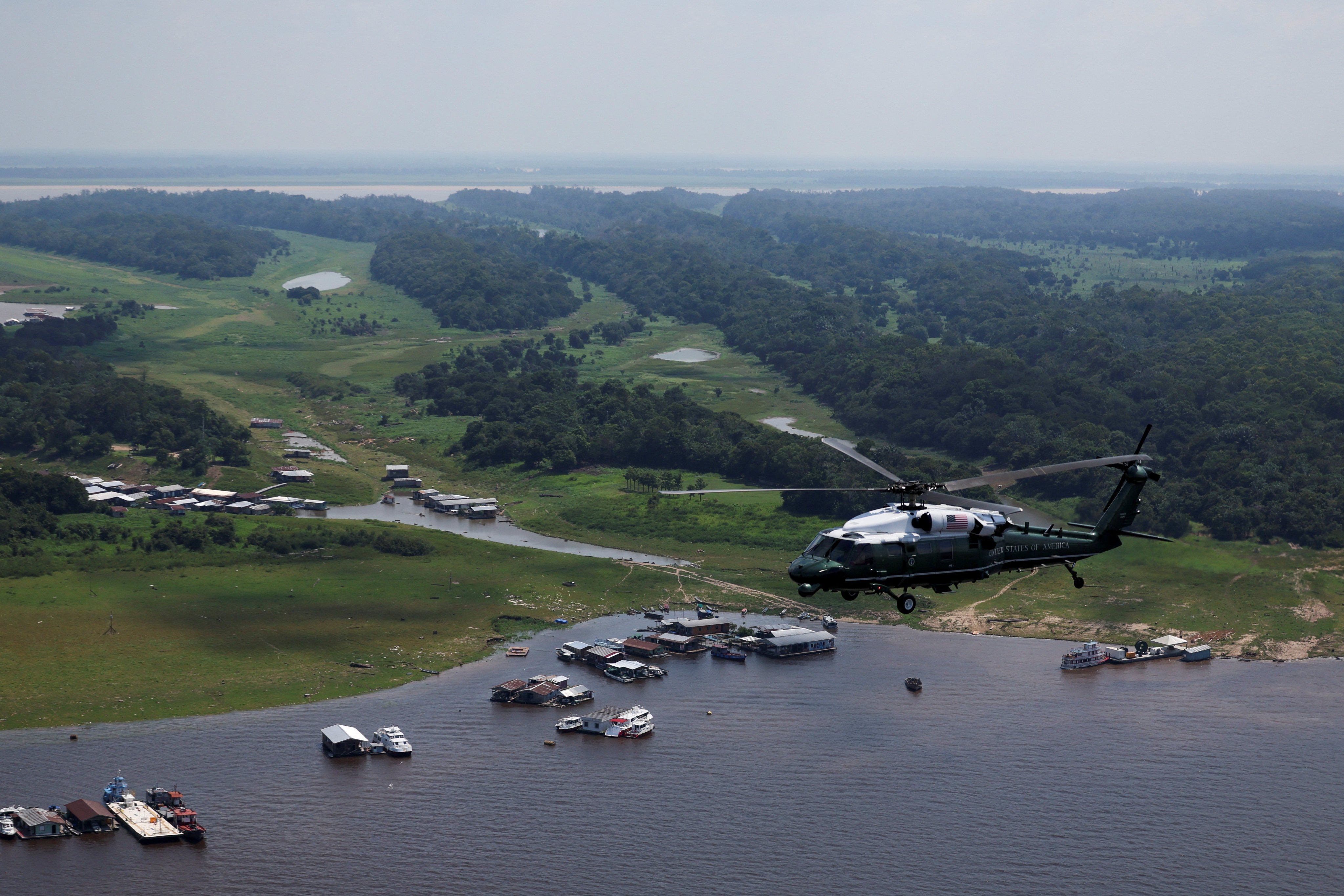 US President Joe Biden in Marine One has an aerial tour of the Amazon in Manaus, Brazil. Photo: Reuters