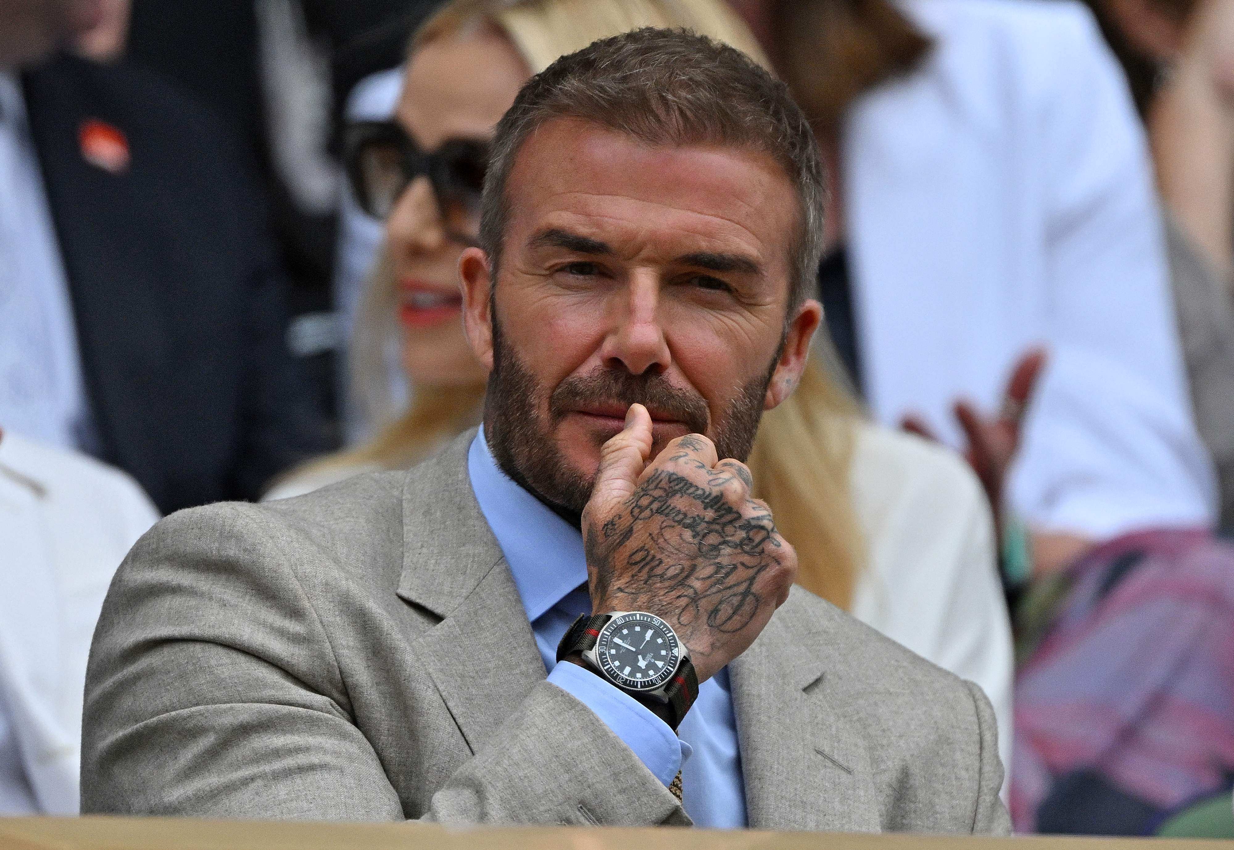 Former England footballer David Beckham sits on Centre Court to watch the men’s singles tennis matches on the first day of the 2024 Wimbledon Championships at The All England Lawn Tennis and Croquet Club in Wimbledon on July 1, 2024. Photo: AFP.