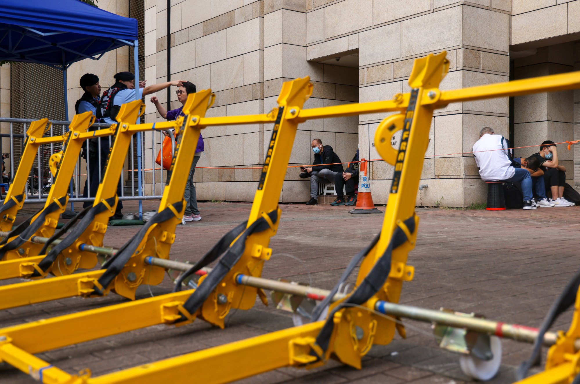 Police have set up barricades outside West Kowloon Court, among other security measures. Photo: Eugene Lee