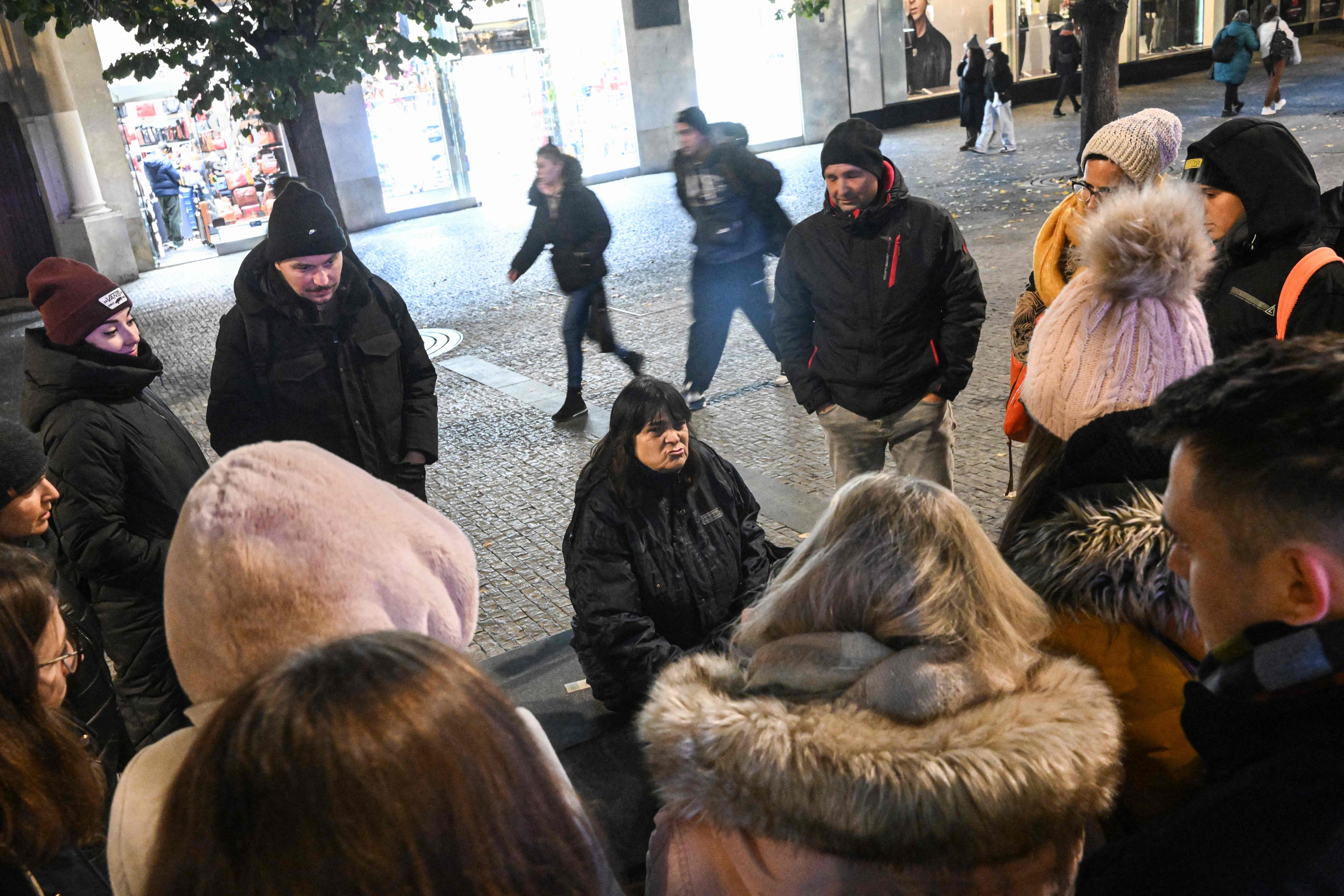 Lada (sitting), a 54-year-old sex worker, takes tourists on a tour of Prague’s underworld. Photo: AFP