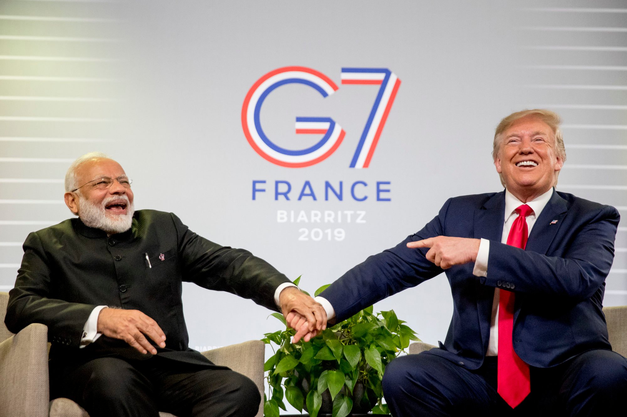 Indian Prime Minister Narendra Modi and then-President Donald Trump share a laugh during the G-7 summit in Biarritz, France on August 26, 2019. Photo: AP