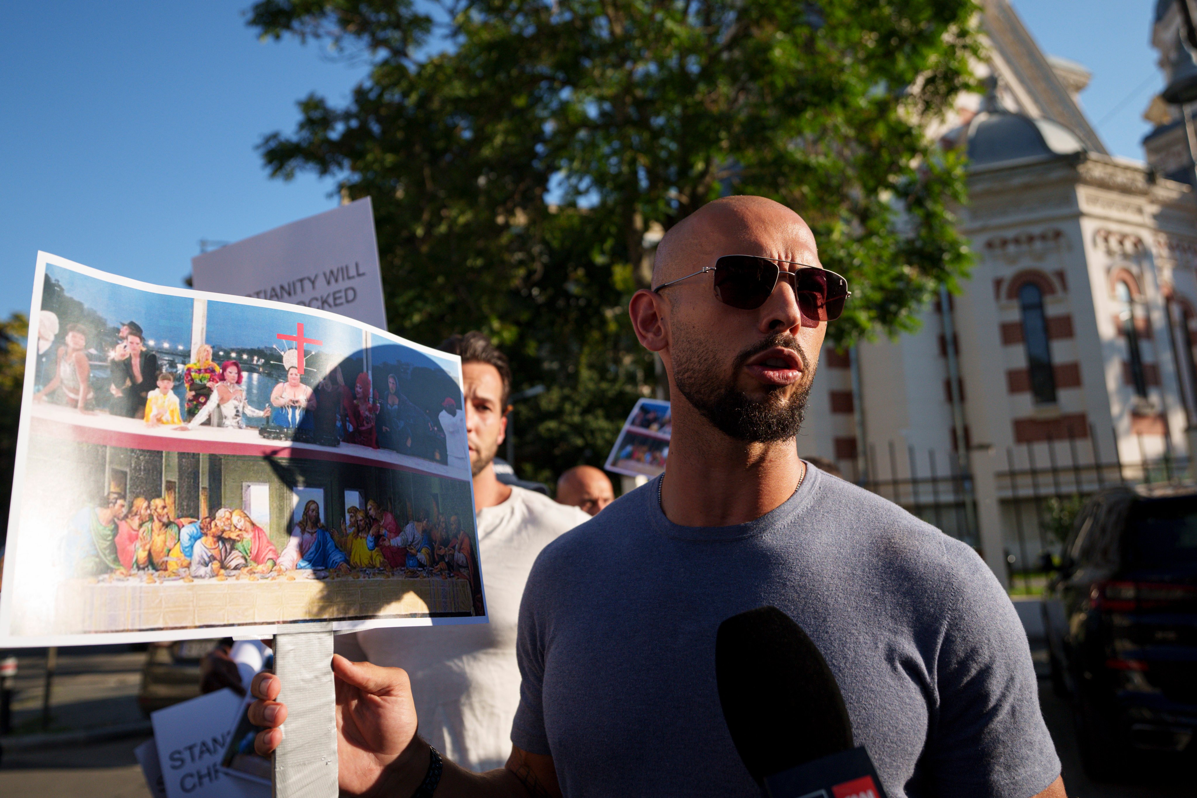 Social media influencer Andrew Tate is seen near the French Embassy in Bucharest, Romania on July 28. Photo: AP