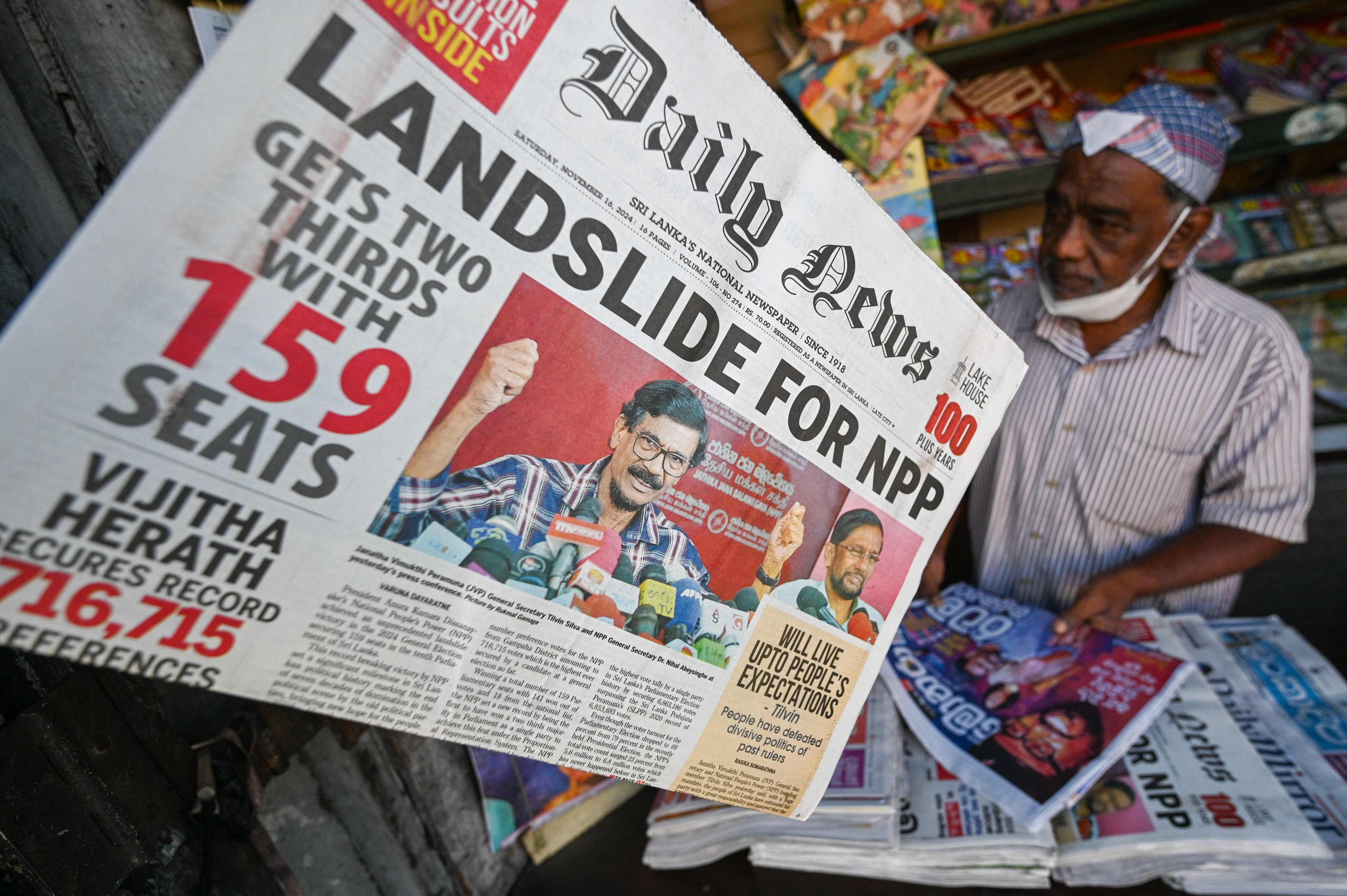 A vendor displays newspapers for sale at a stall in Kandy on November 16, 2024. Sri Lankan President Anura Kumara Dissanayake’s leftist coalition won a majority in snap parliamentary polls, provisional results showed on November 15. Photo: AFP