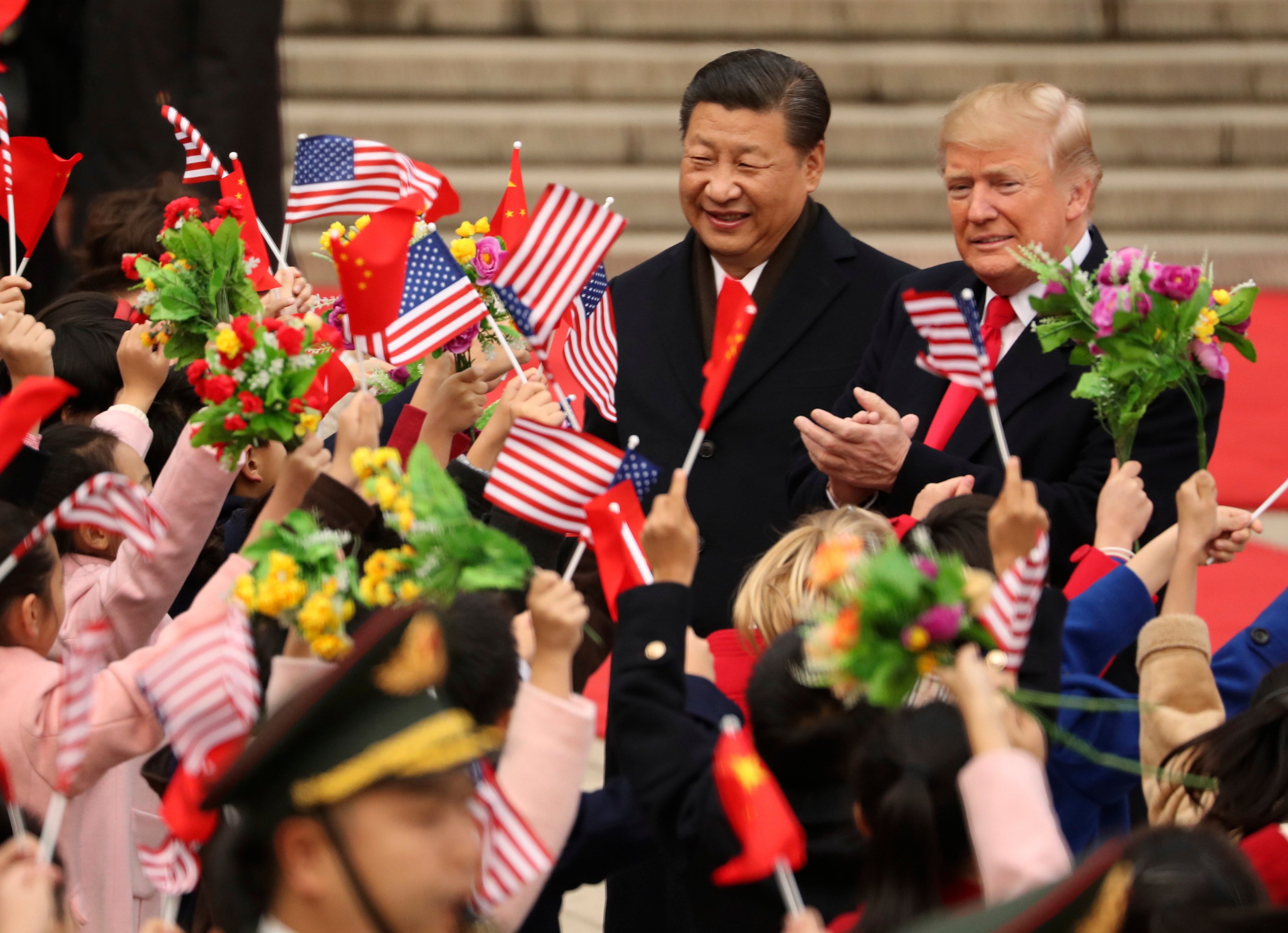 Chinese President Xi Jinping and then-US president Donald Trump participate in a welcome ceremony at the Great Hall of the People in Beijing on November 9, 2017. Photo: AP