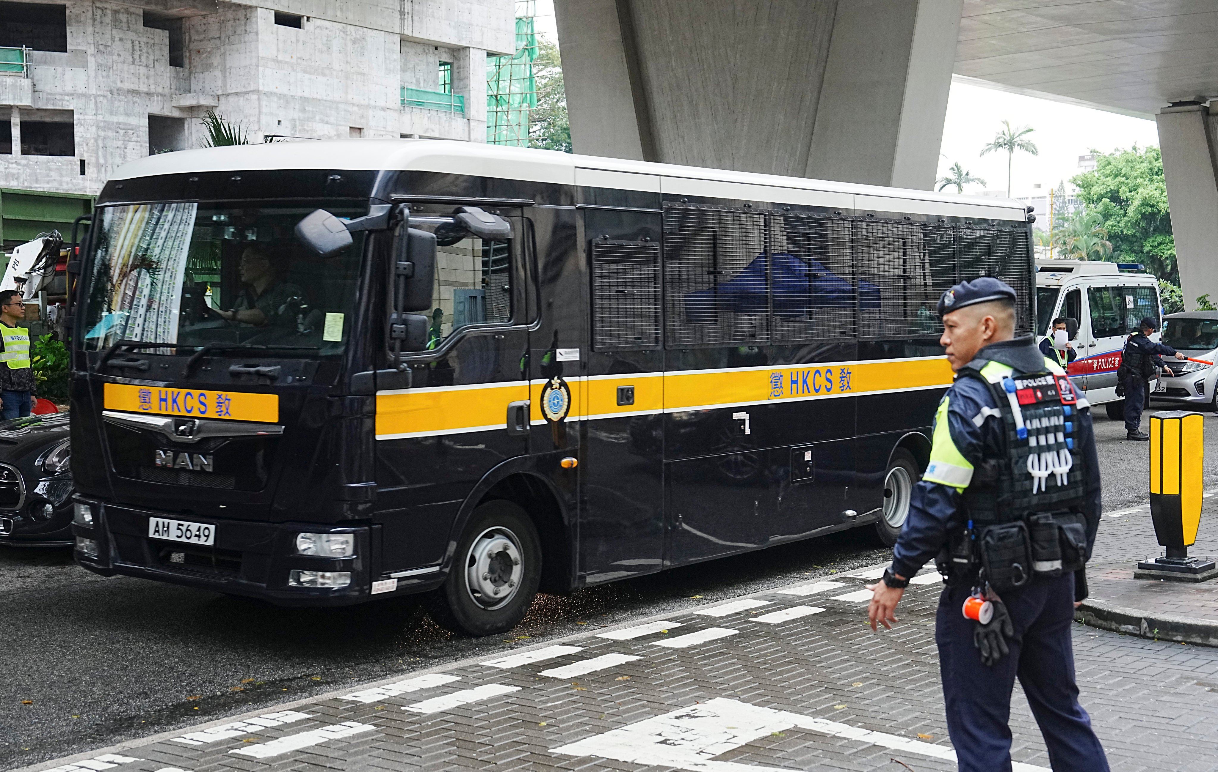 A vehicle carries defendants to court for the “Hong Kong 47” subversion case. Photo: Elson Li