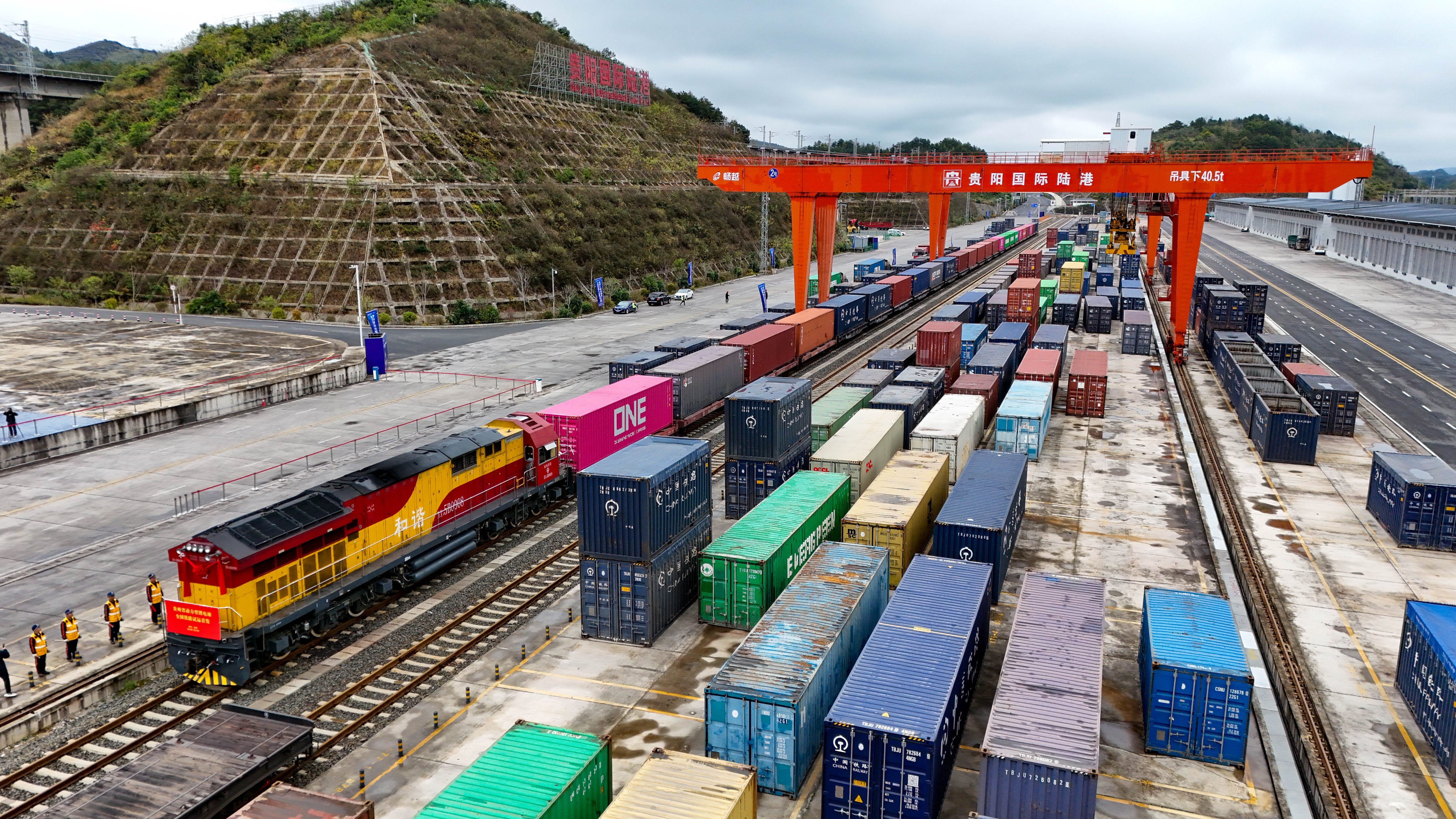 On Tuesday, a train is shown loaded with lithium batteries at Dulaying international land-sea logistics port in Guiyang, in Guizhou province. Xinhua said 3 trains loaded with lithium batteries left from Chongqing, Guiyang and Yibin on Tuesday, marking the first large-scale test of rail transport for the  batteries in China. Photo: Xinhua
