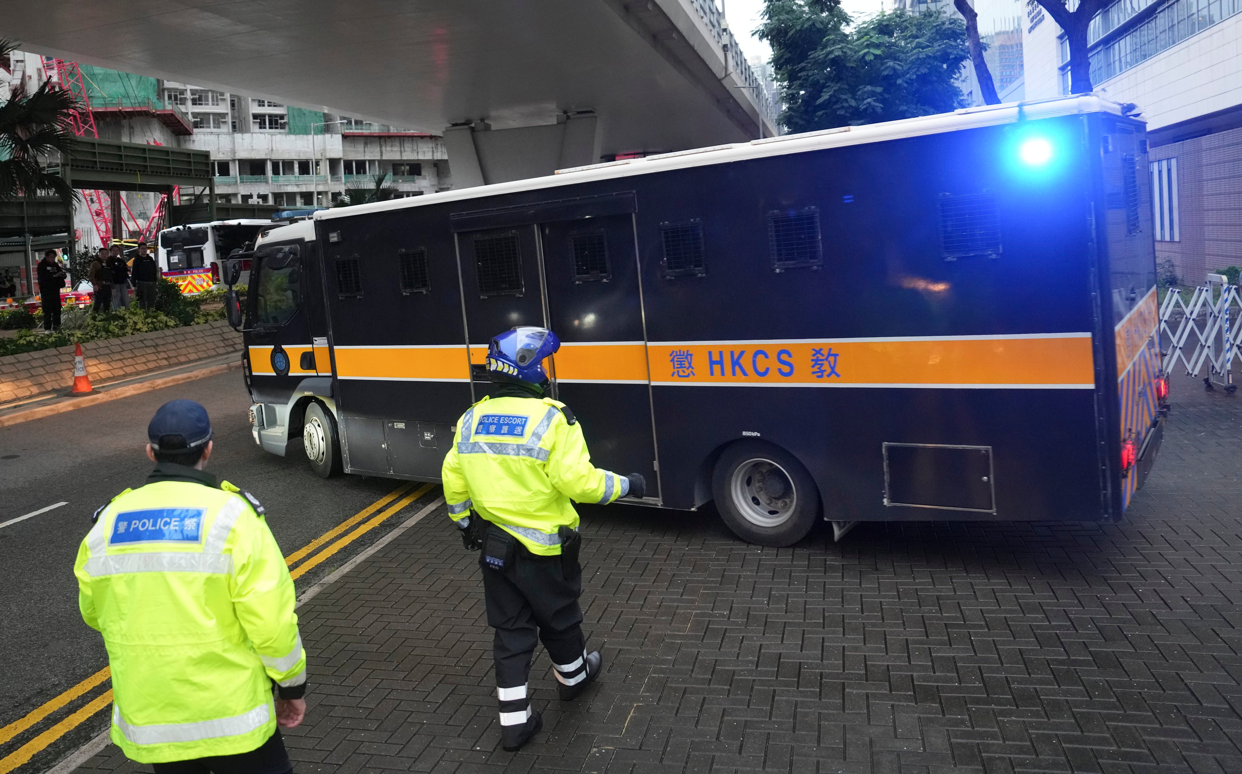 Hong Kong 47 case defendants escorted by a Correctional Services Department vehicle on November 19, 2024. Photo: Elson Li