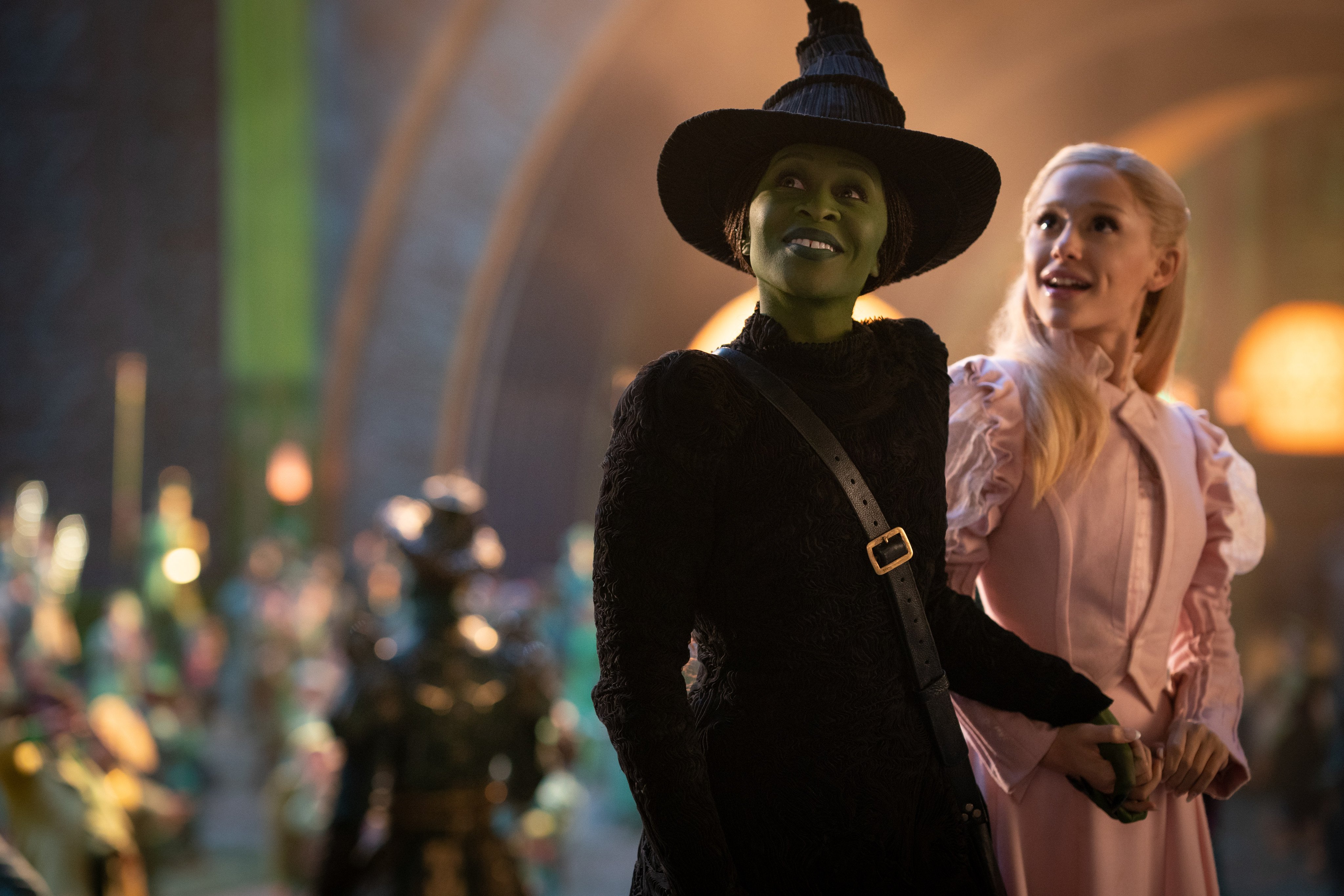 Cynthia Erivo (left) as Elphaba and Ariana Grande-Butera as Glinda in a still from Wicked. Photo: Universal Pictures