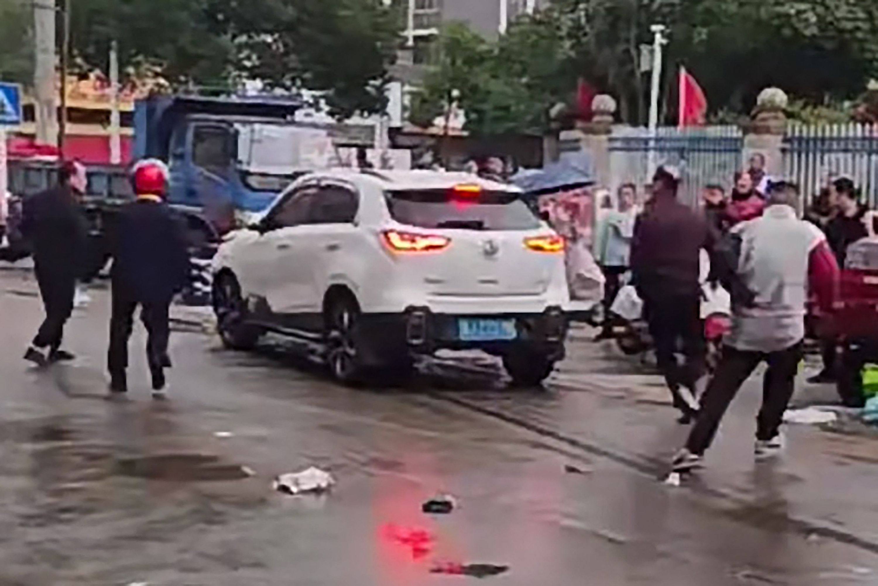 Video footage circulating online showed the aftermath of the incident outside a school in Hunan. Photo: AFP
