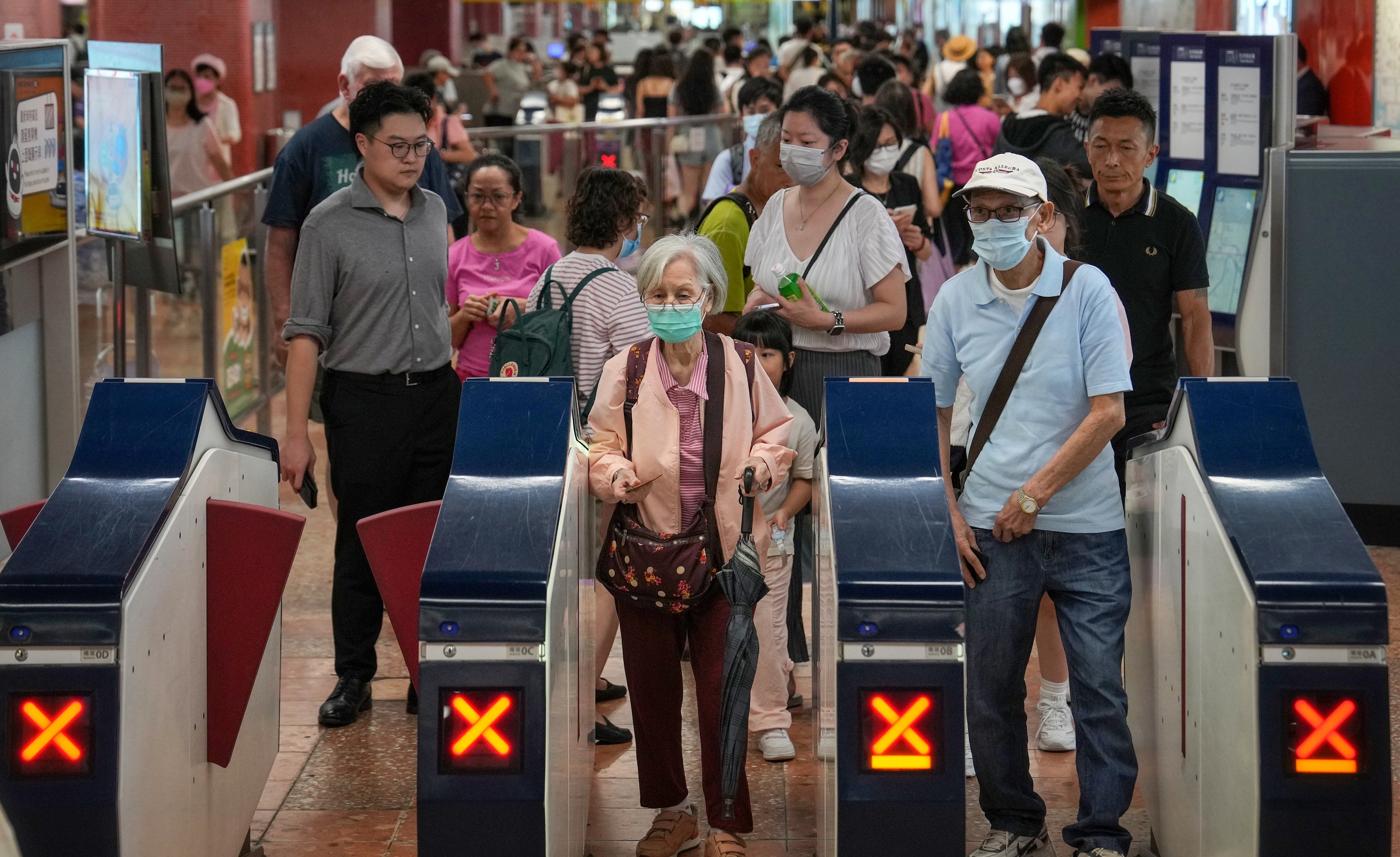 Passengers entering Mong Kok MTR station. Photo: Elson Li