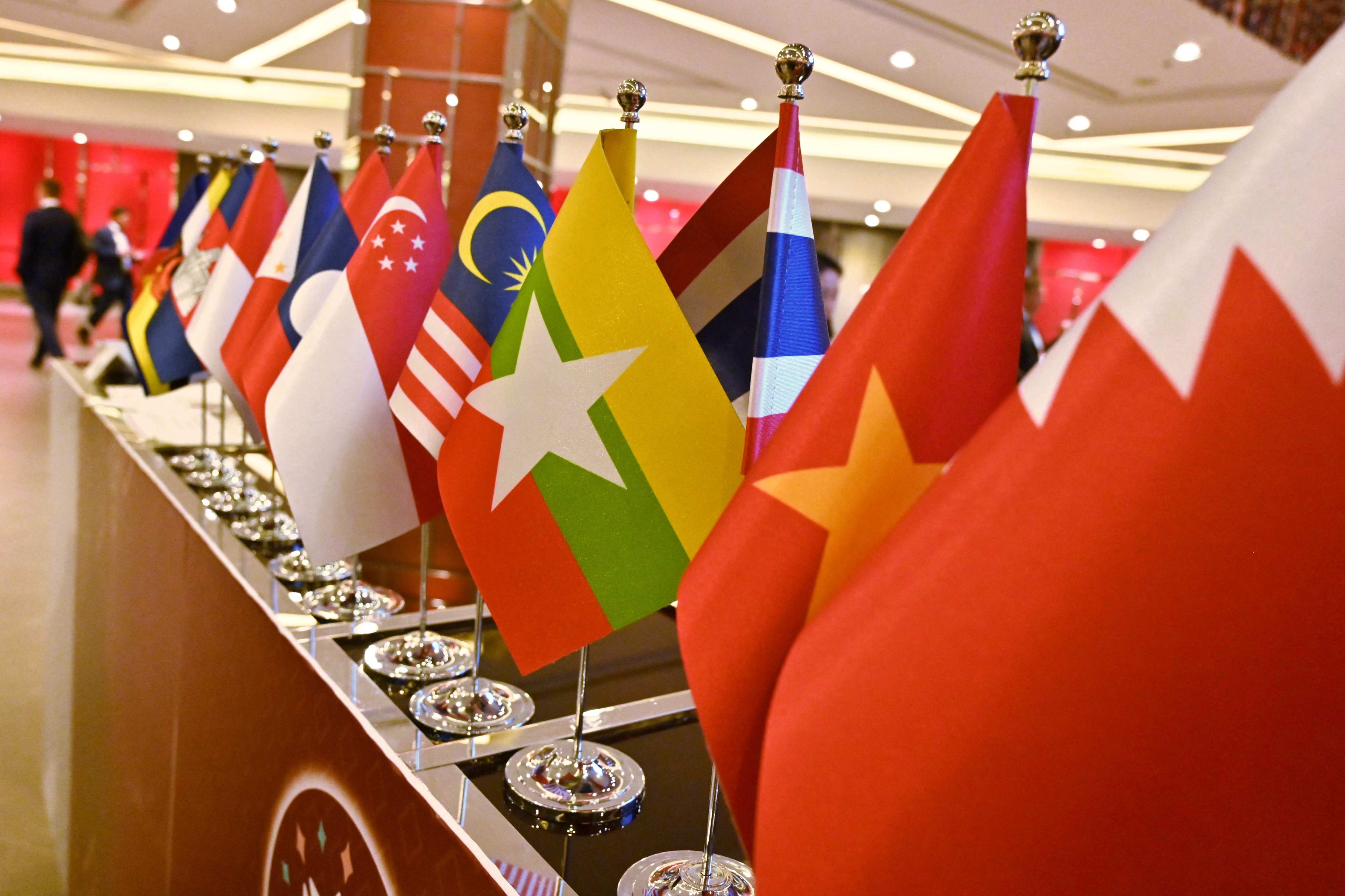 The national flags of the various countries attending the 35th Association of Southeast Asian Nations Summit are displayed in Bangkok. Photo: AP