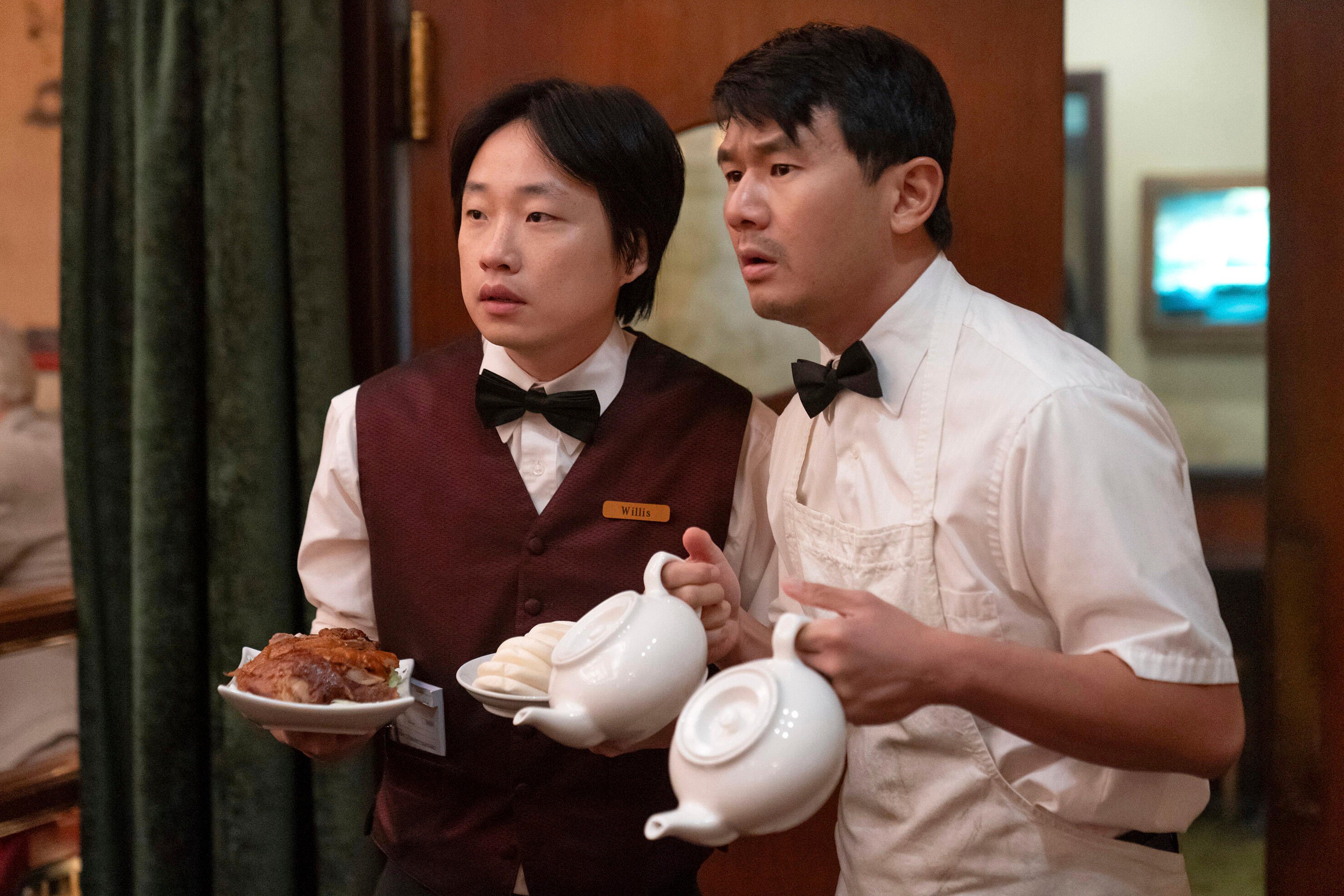 Jimmy O. Yang (left) and Ronny Chieng in a still from Interior Chinatown. Photo: Mike Taing/Hulu via AP