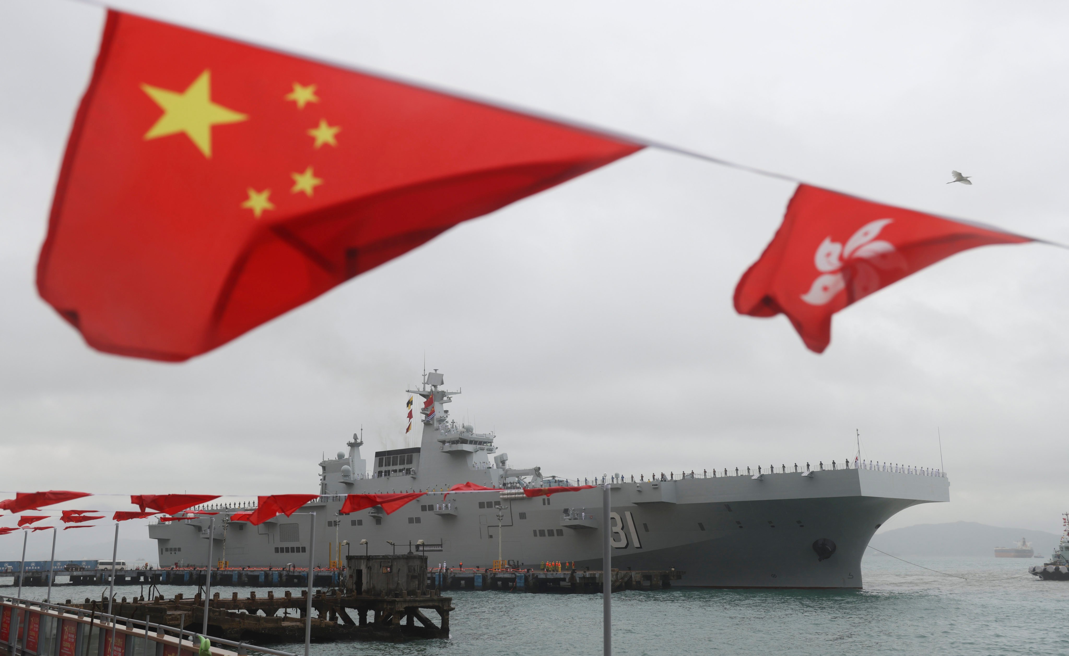 Hainan, a Type 075 landing helicopter dock, at China Merchants Wharf in Kennedy Town. Photo: Eugene Lee