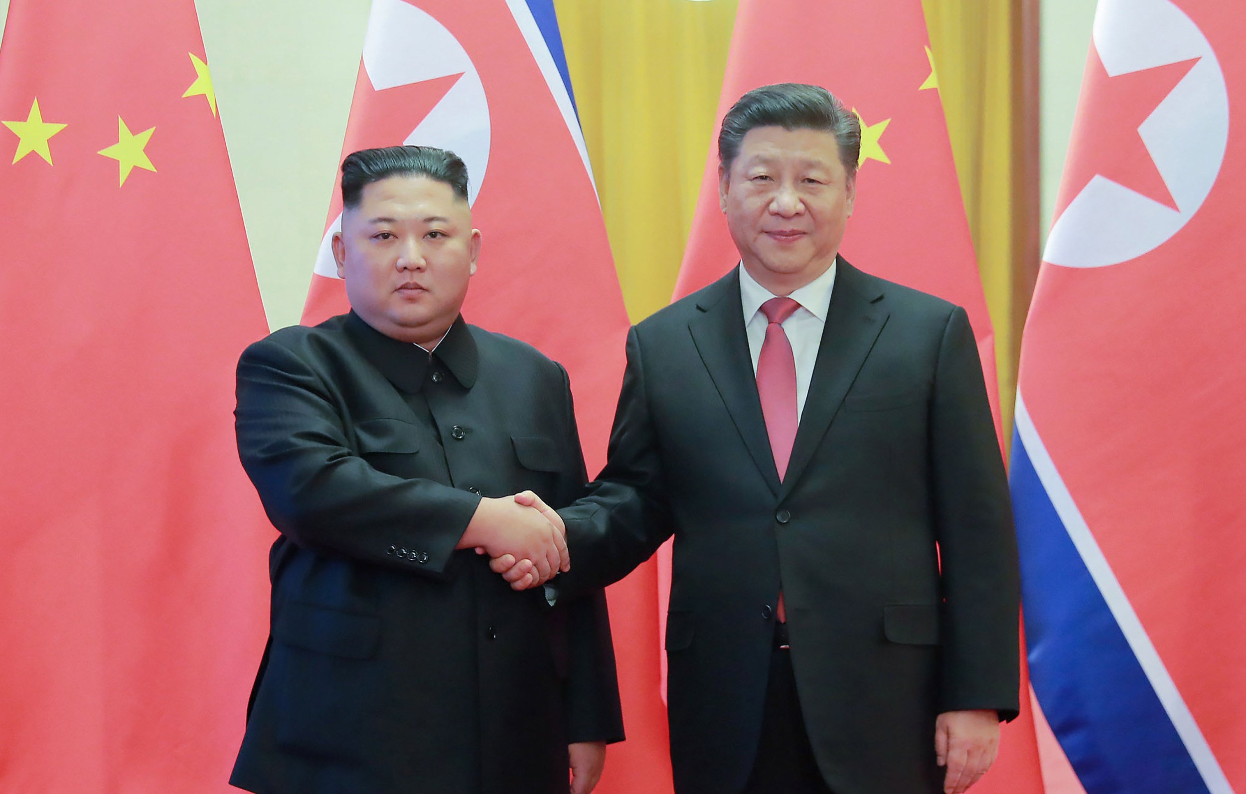 North Korean leader Kim Jong-un with China’s President Xi Jinping. The Korean peninsula is a growing political headache for Beijing, according to observers. Photo: KCNA VIA KNS/AFP