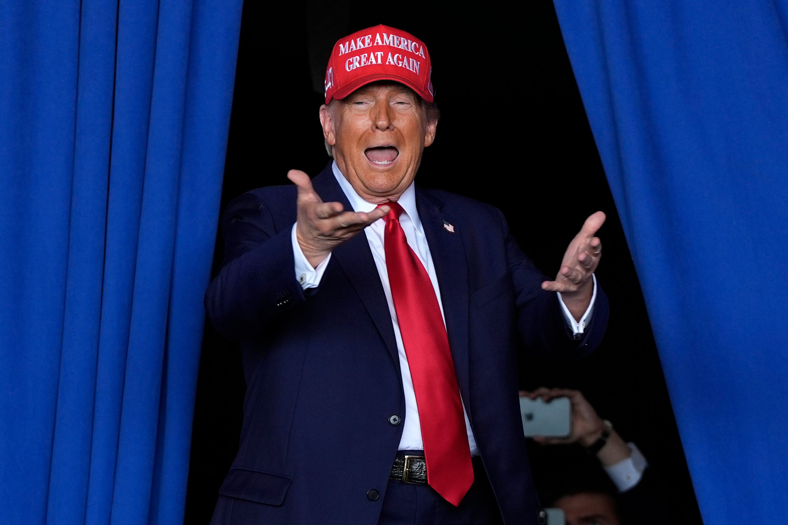 Donald Trump arrives to speak at a campaign rally last month. Photo: AP