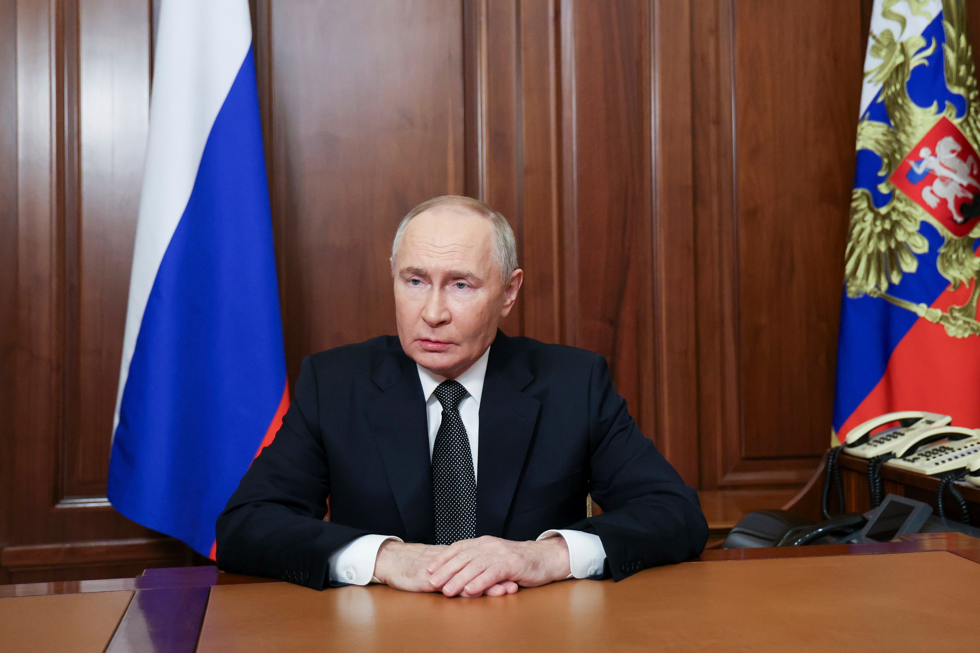 Russian President Vladimir Putin addressees the nation at the Kremlin in Moscow on Thursday. Photo: Sputnik, Kremlin Pool Photo via AP