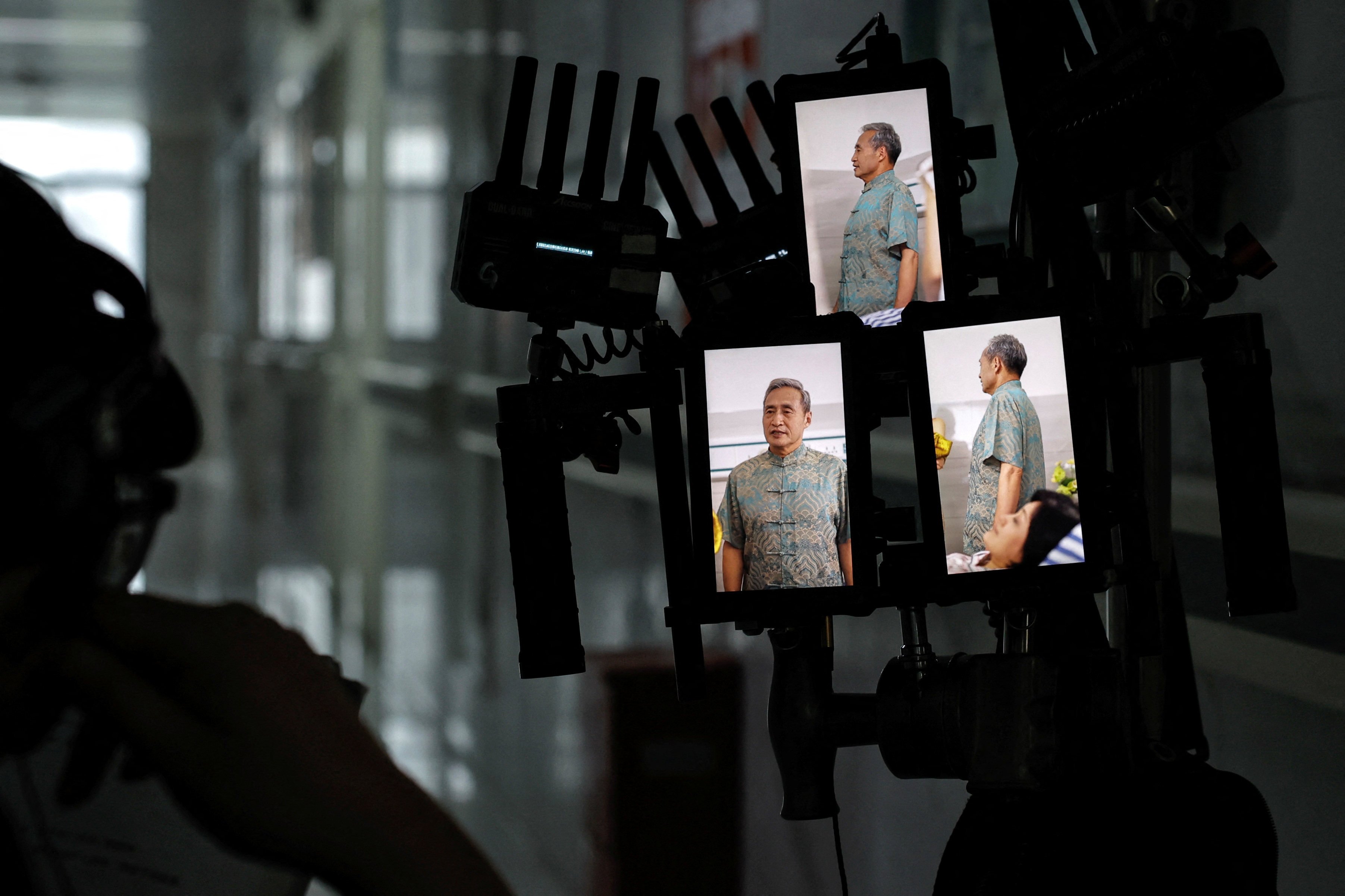 A director monitors from vertical screens while filming specialised short-video content that has become increasingly popular in the United States. Photo: Reuters