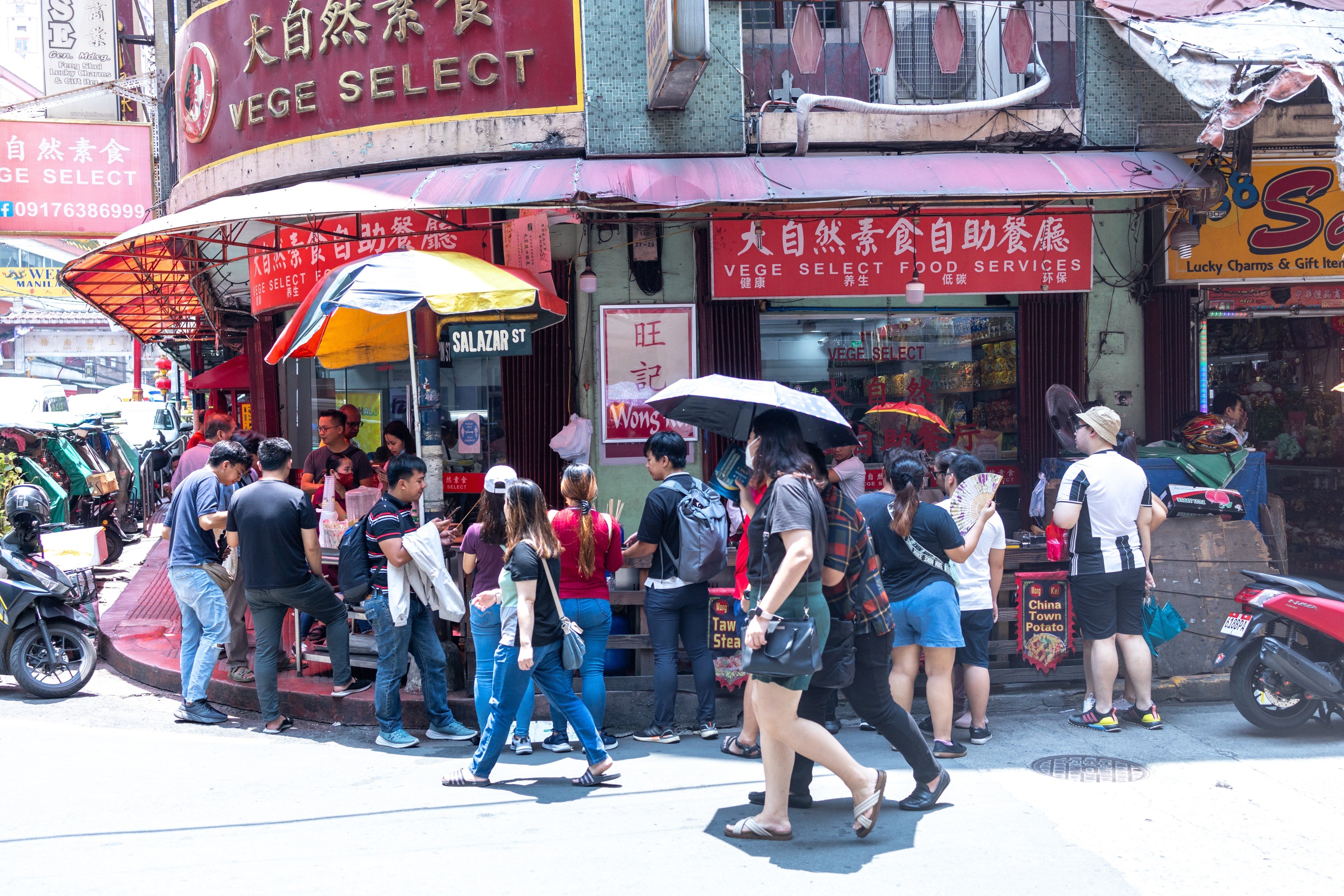 People buying food at a restaurant in Chinatown, Manila, Philippines. Photo: Shutterstock