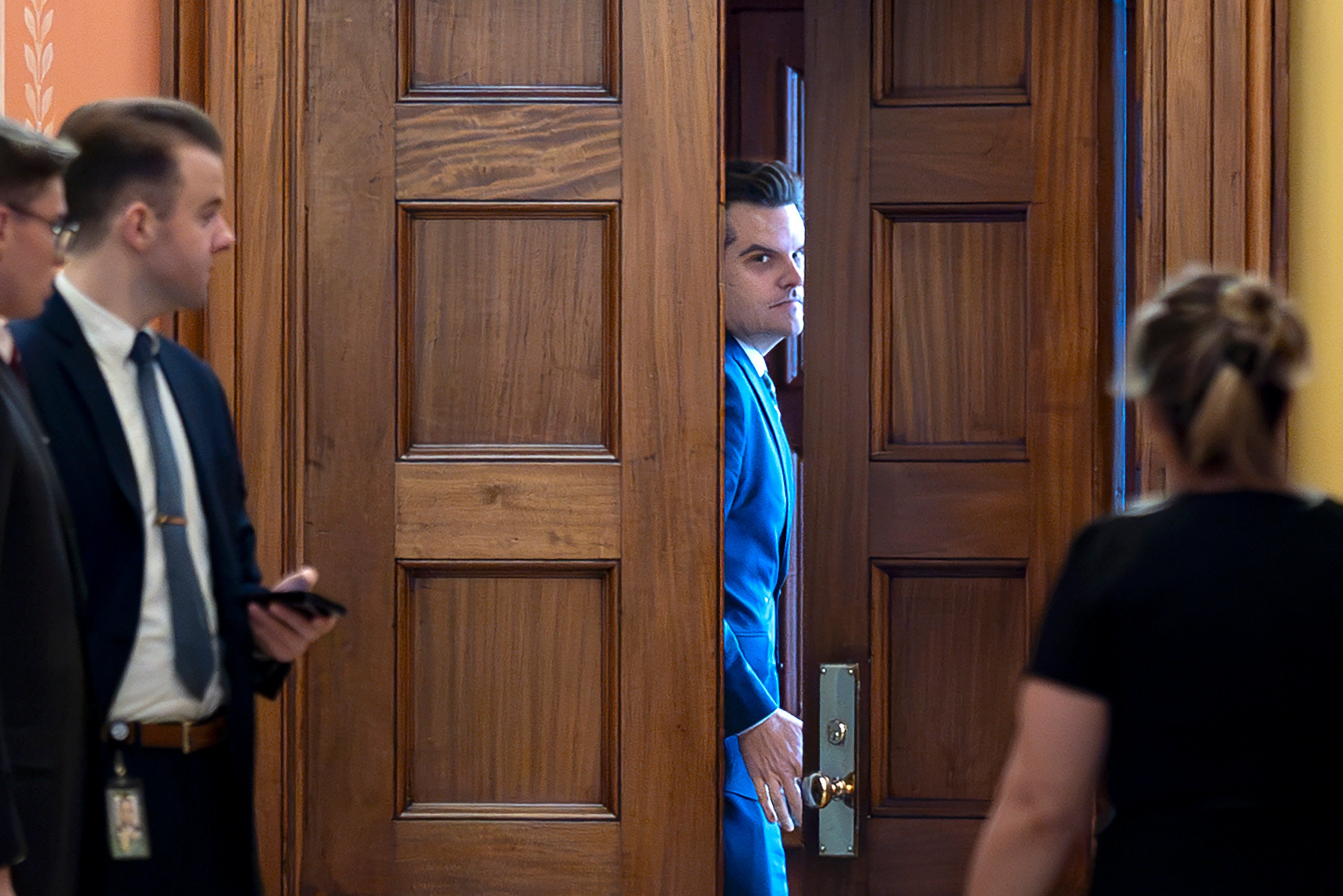 Matt Gaetz closes a door to a private meeting with Vice-President-elect J.D. Vance and Republican Senate Judiciary Committee members, at the Capitol in Washington, on Wednesday. Photo: AP 