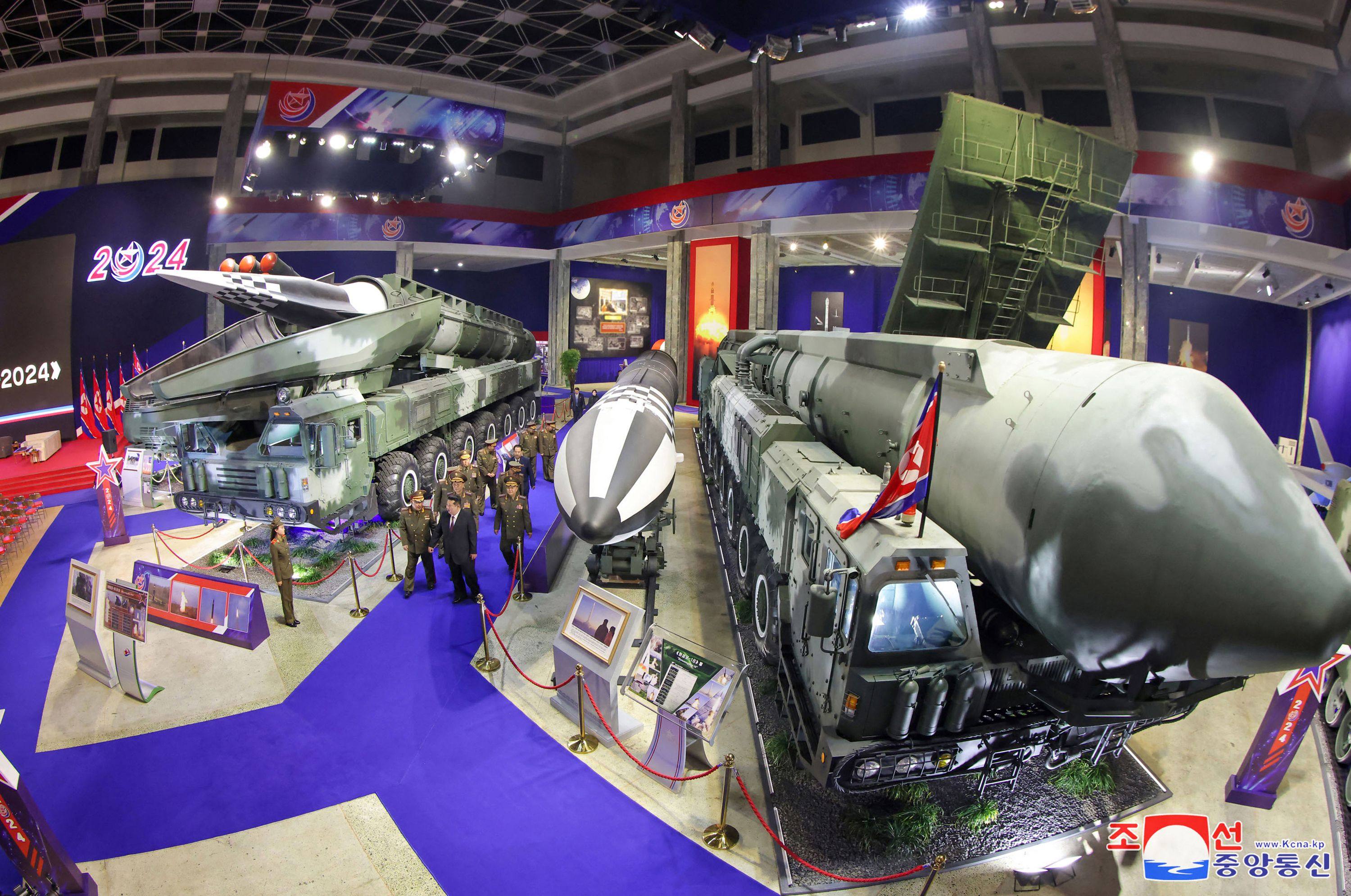 North Korean leader Kim Jong-un (front centre) visits a defence exhibition in Pyongyang on November 21. Photo: KCNA via KNS/AFP