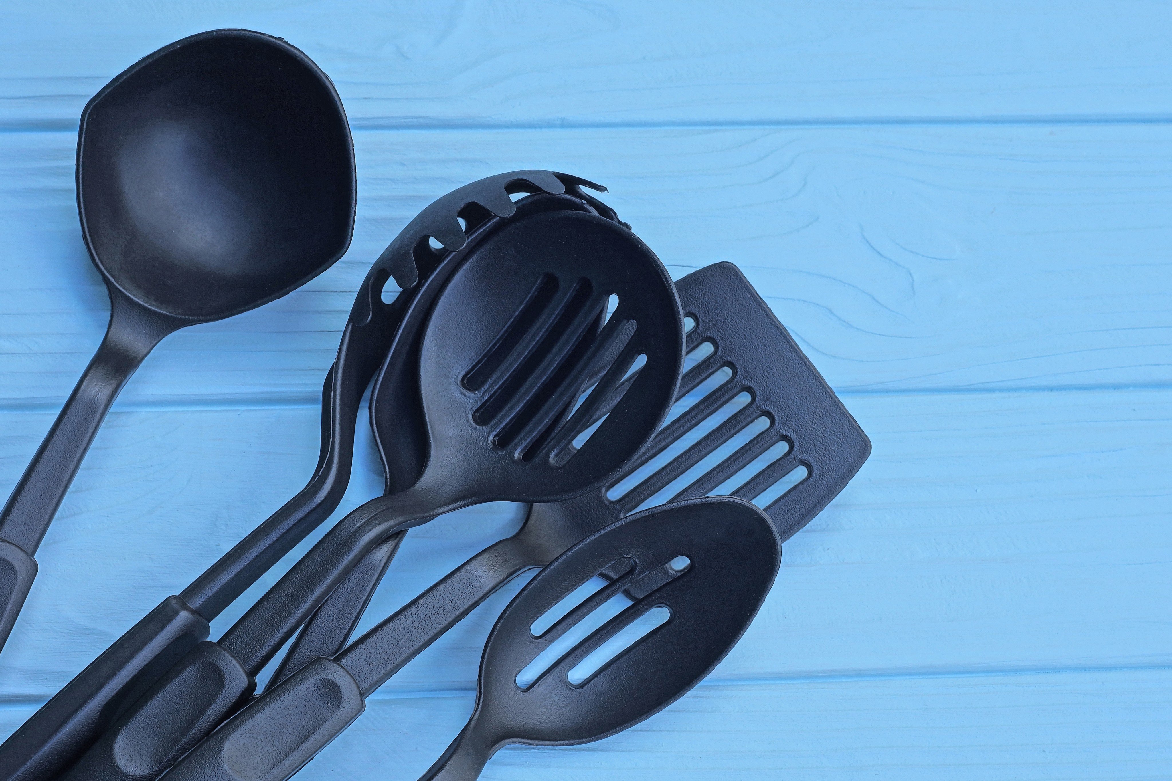 Everyday household items made of black recycled plastic, including kitchen utensils, takeaway containers, toys and hair accessories, have a high chance of containing dangerous levels of flame retardants and other toxic chemicals, a new study finds. Photo: Shutterstock Images