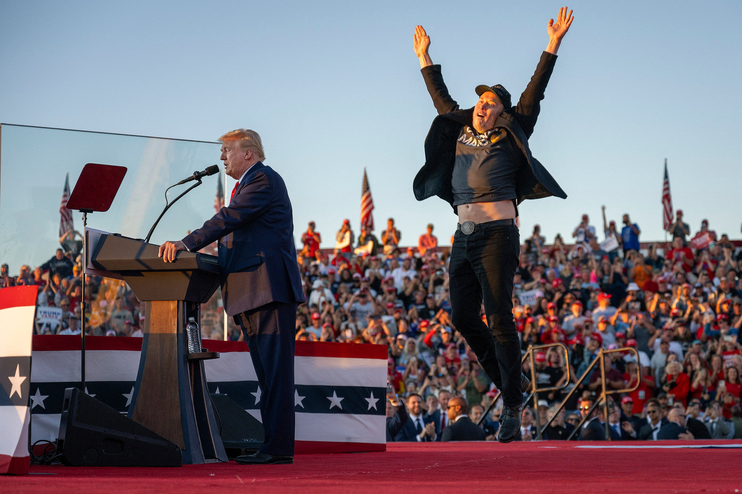 Elon Musk jumps on stage as he joins then presidential candidate Donald Trump during a campaign rally in the US state of Pennsylvania in October. Photo: TNS