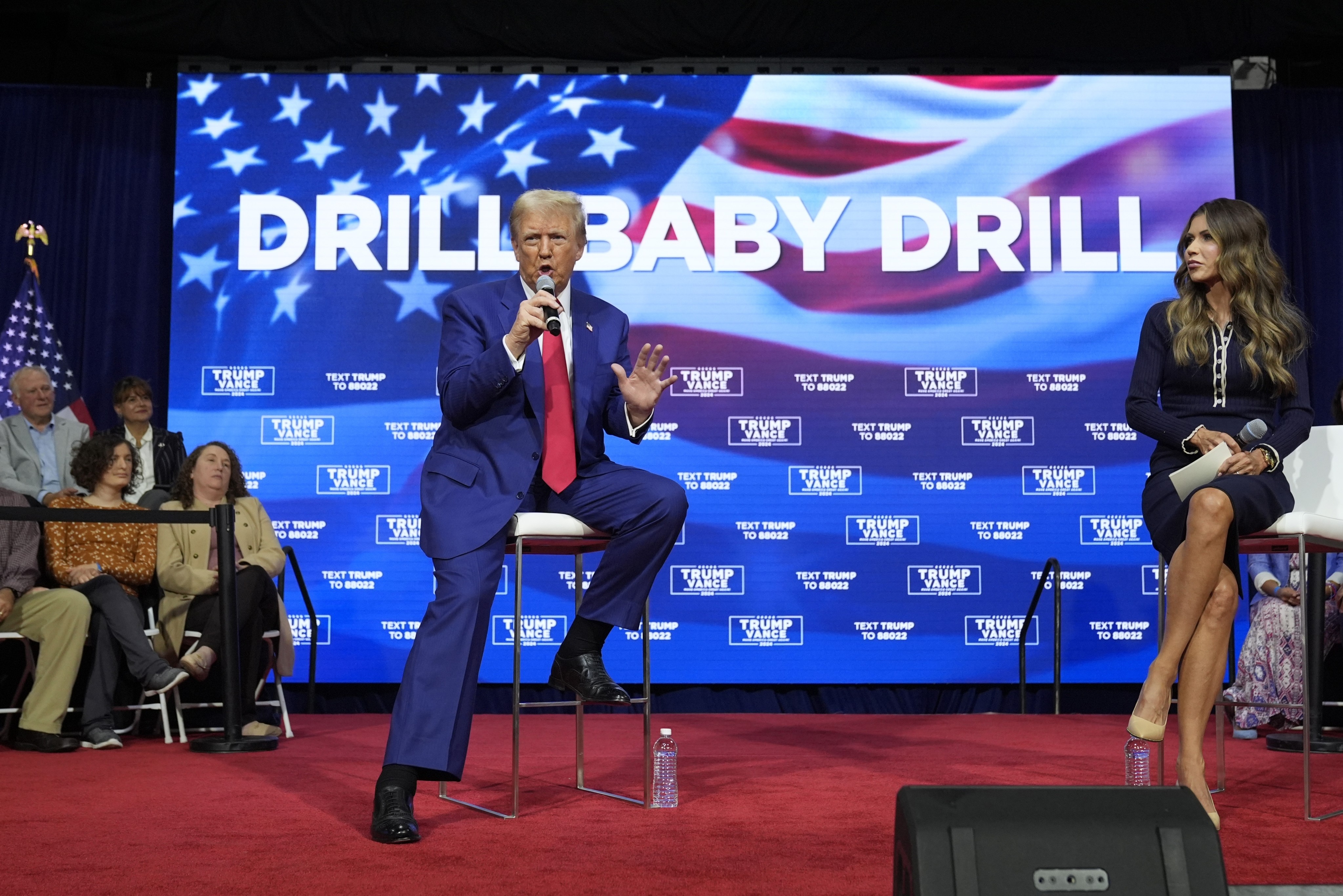 Then-Republican presidential nominee Donald Trump speaks at a campaign town hall at the Greater Philadelphia Expo Center & Fairgrounds, on October 14, on stage with moderator South Dakota Gov. Kristi Noem. Photo: AP