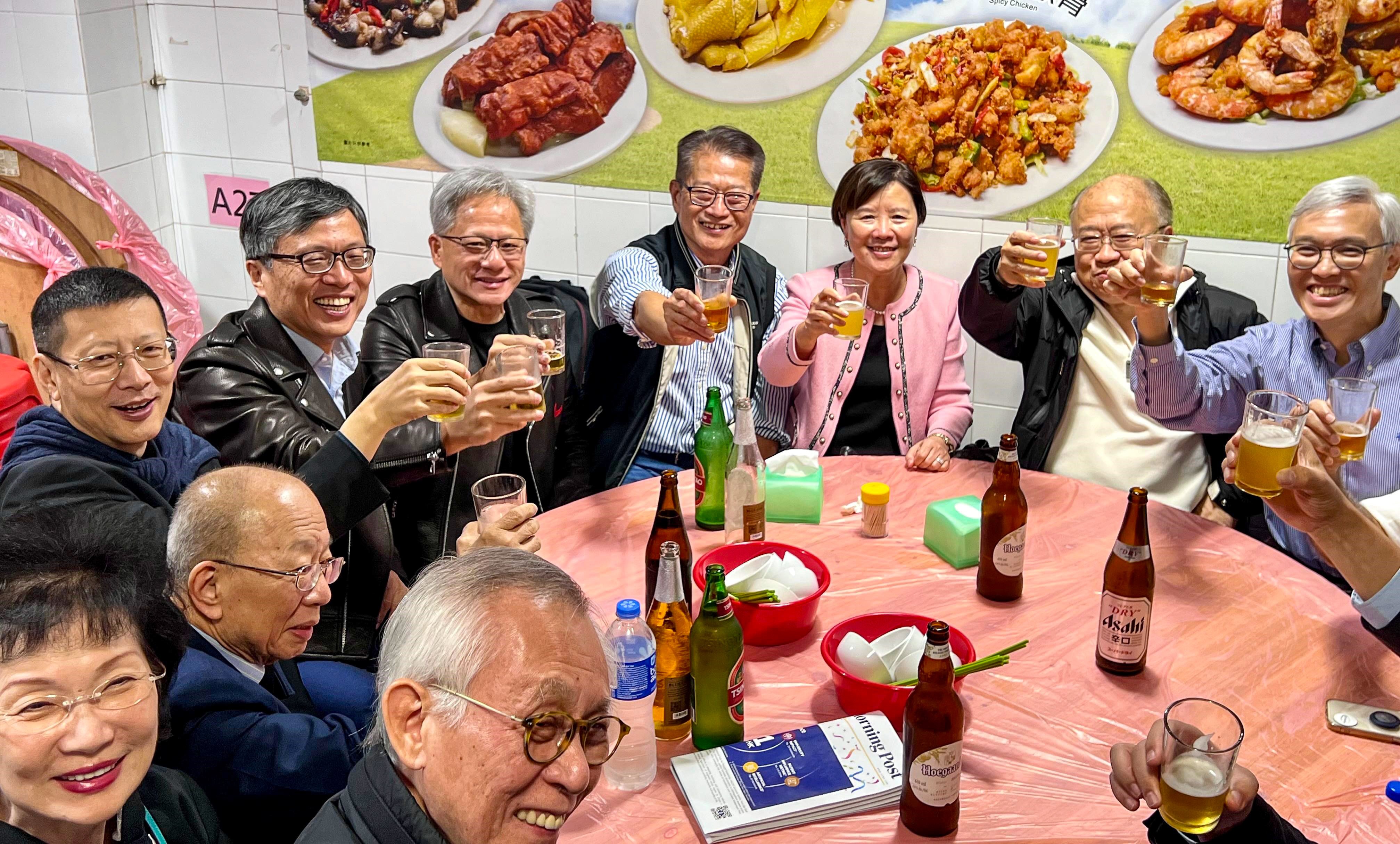 Financial Secretary Paul Chan (fourth from right) seated between Nvidia founder Jensen Huang and HKUST president Nancy Ip, among other I&T sector heavyweights. Photo: FS blog