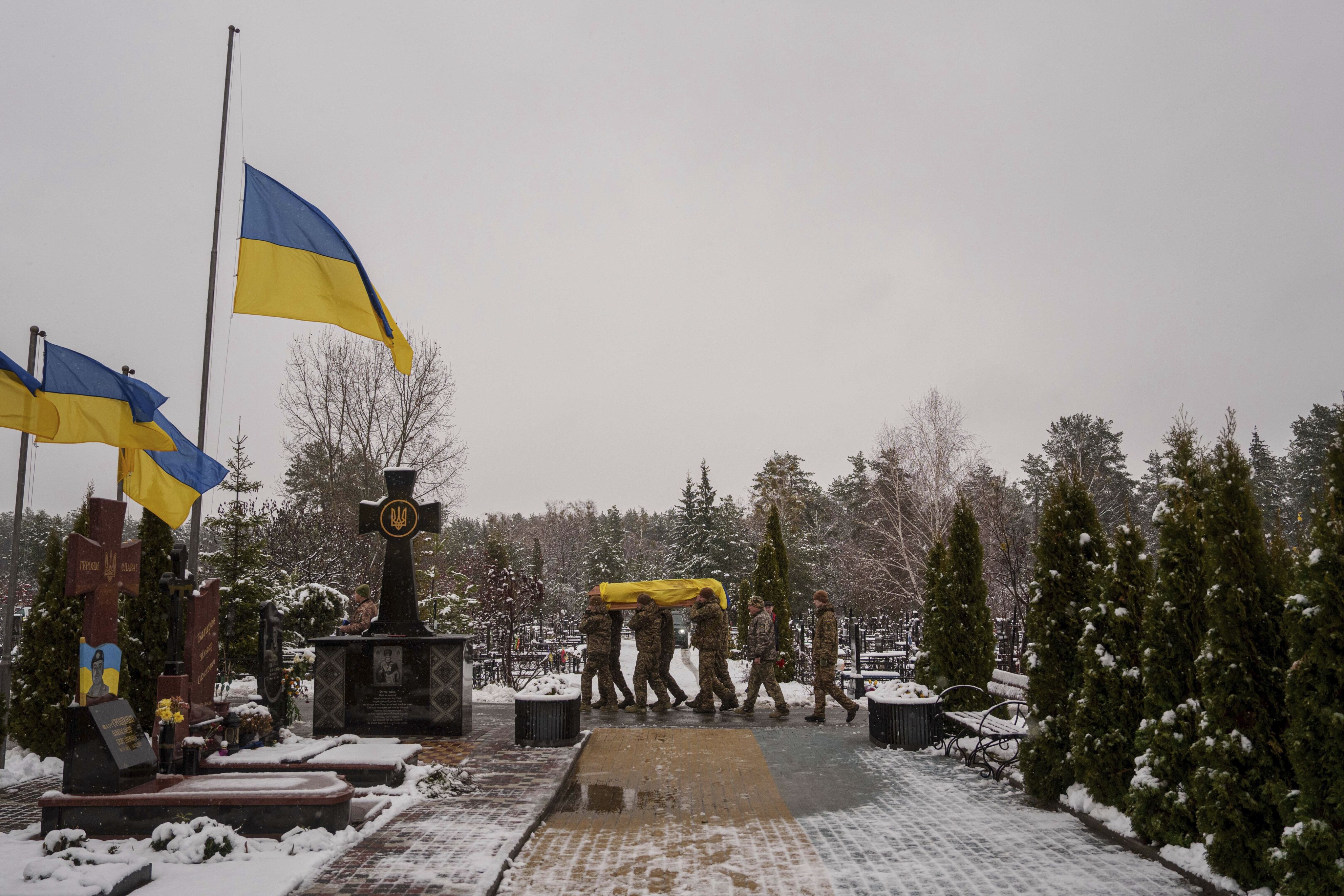 Honor Guards carry the coffin of fallen Ukrainian serviceman of the 47th brigade Serhii Solovyov, who was killed during fighting with Russian Forces in Kursk oblast on November 12, in Irpin, Kyiv region, Ukraine, on Thursday. Photo: AP