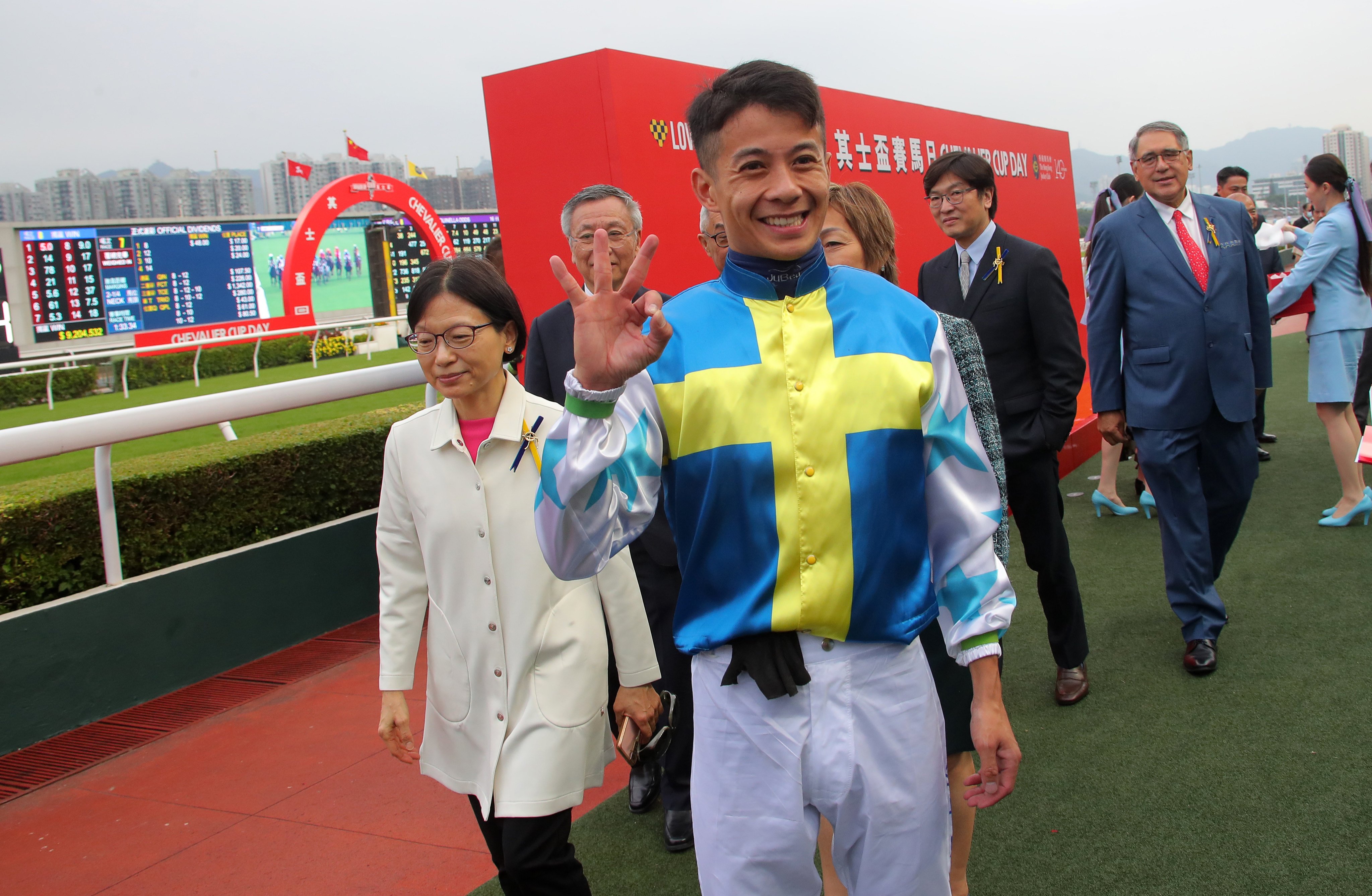 Derek Leung celebrates his treble at Sha Tin on Sunday. Photos: Kenneth Chan