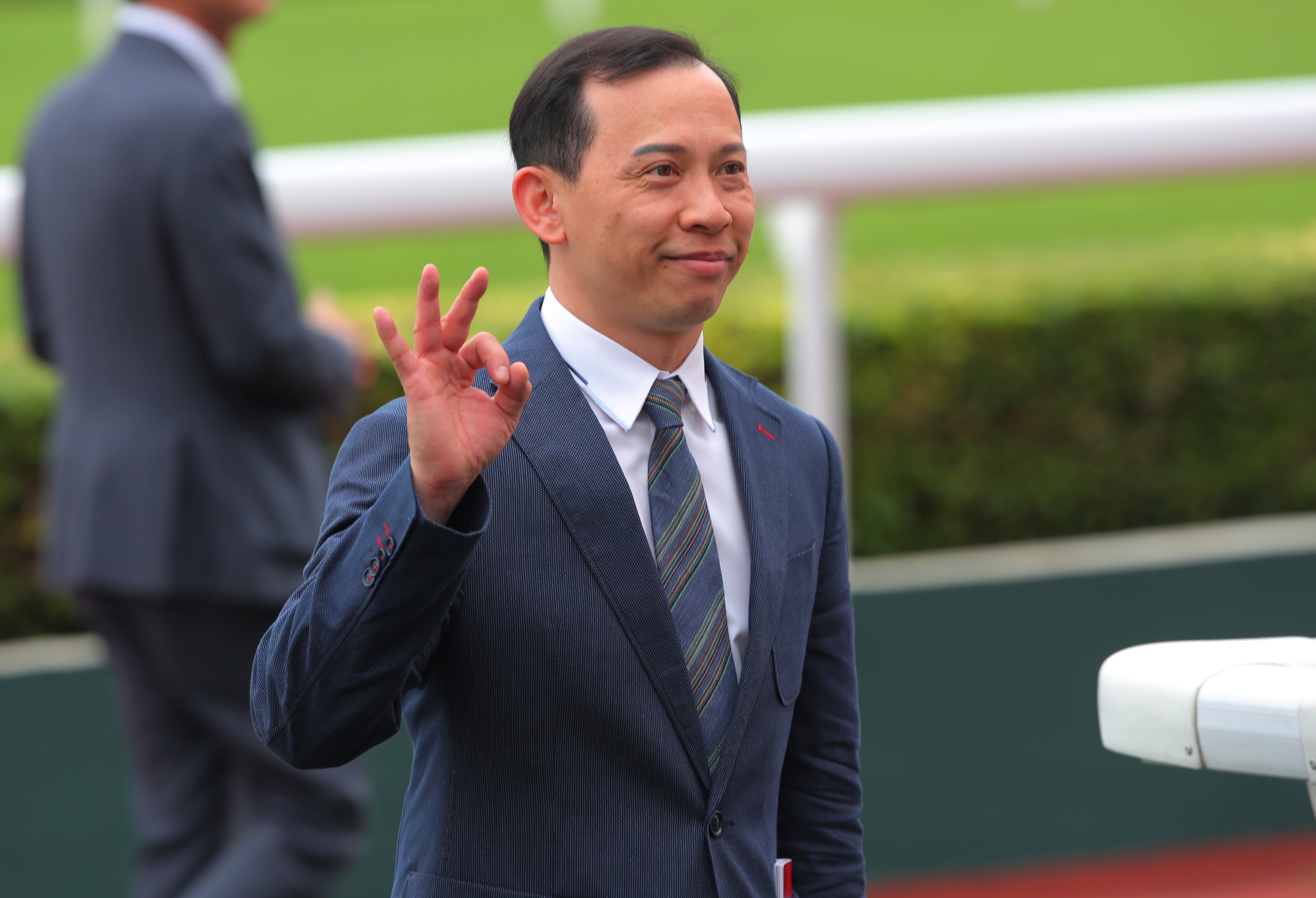 Cody Mo enjoys his maiden treble at Sha Tin on Sunday. Photo: Kenneth Chan