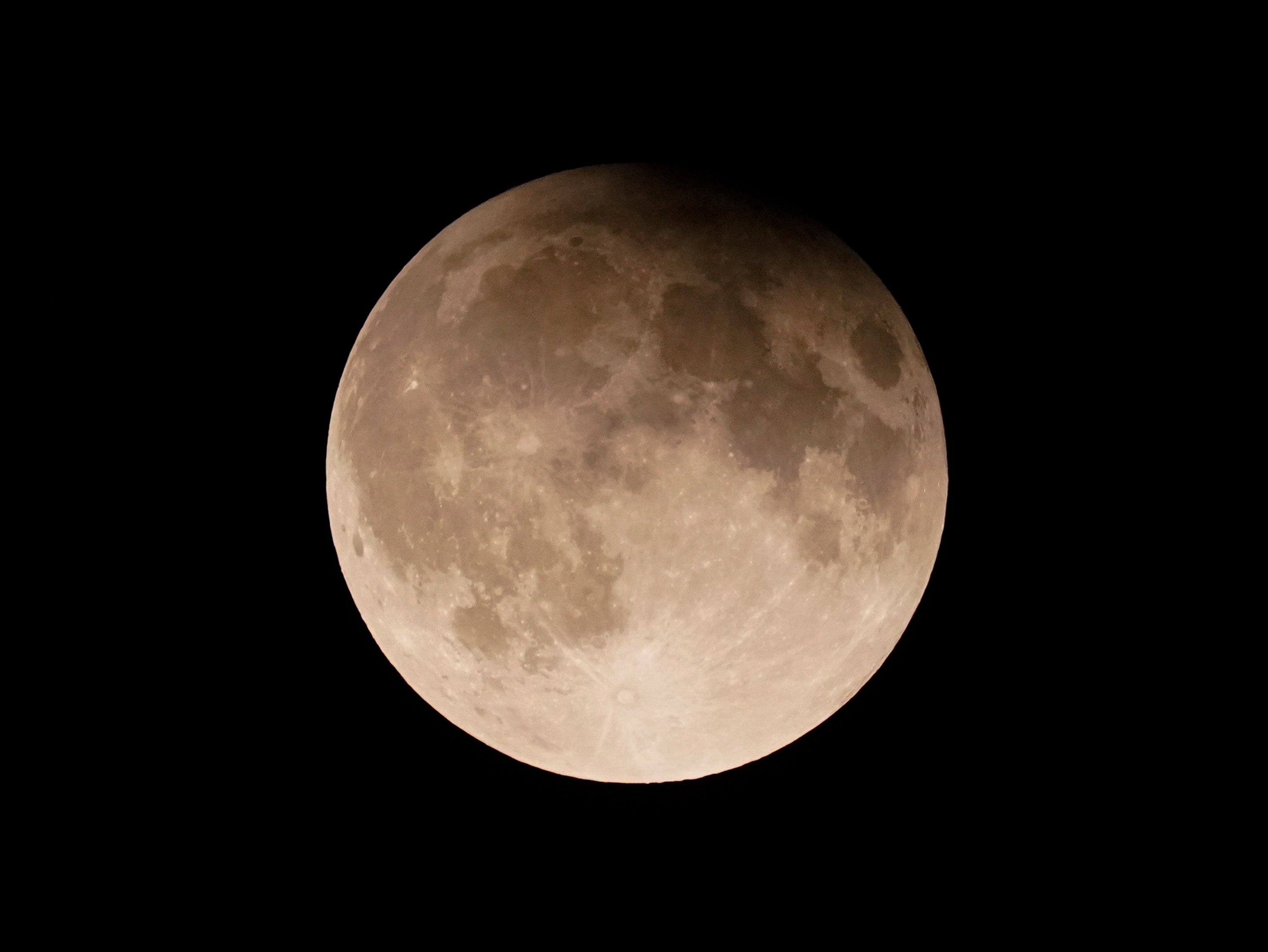 A supermoon with a partial lunar eclipse. File photo: AP