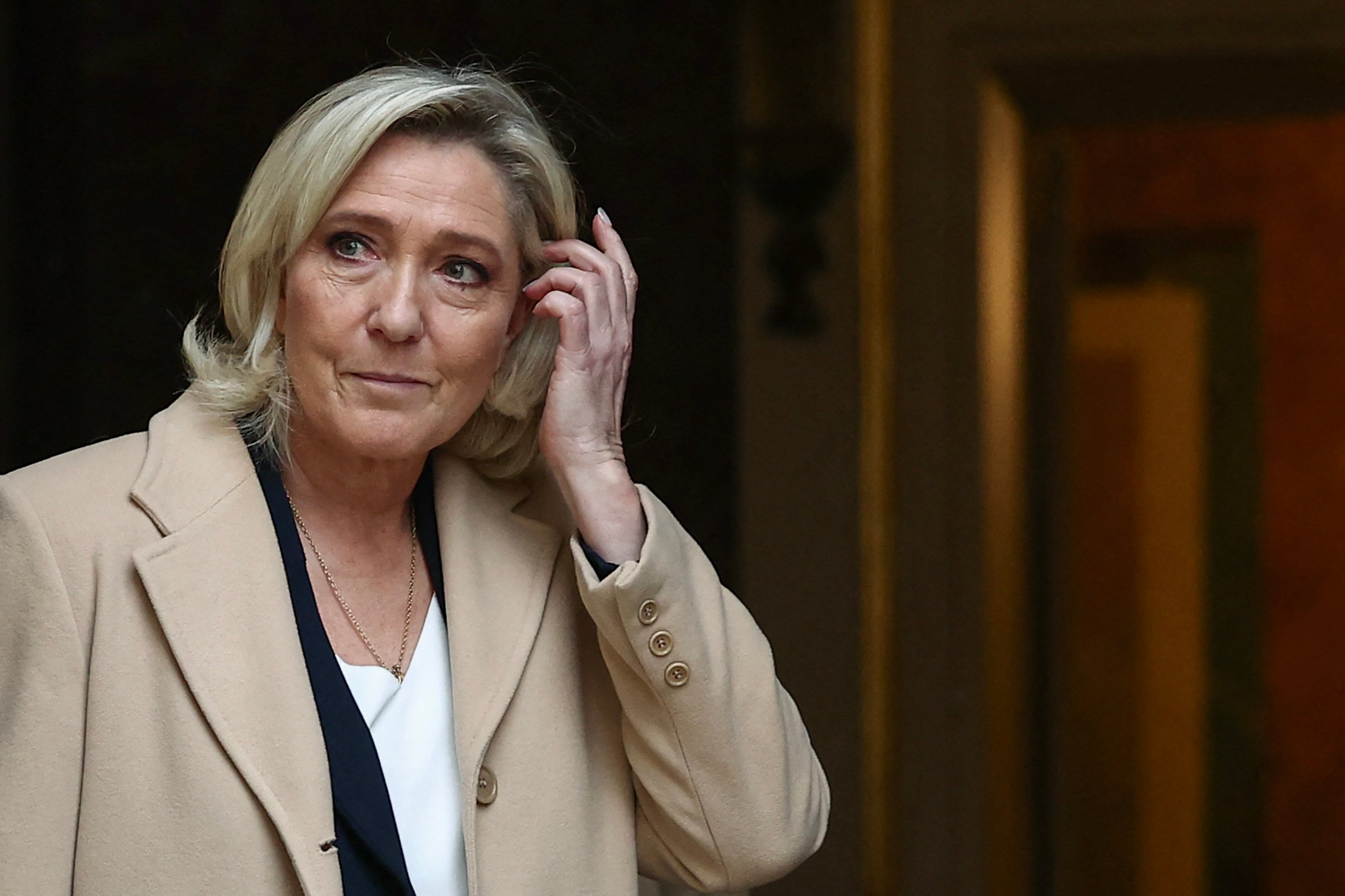 French President of far-right party Rassemblement National parliamentary group Marine Le Pen leaves after a meeting with the French Prime Minister in Paris on November 25. Photo: AFP