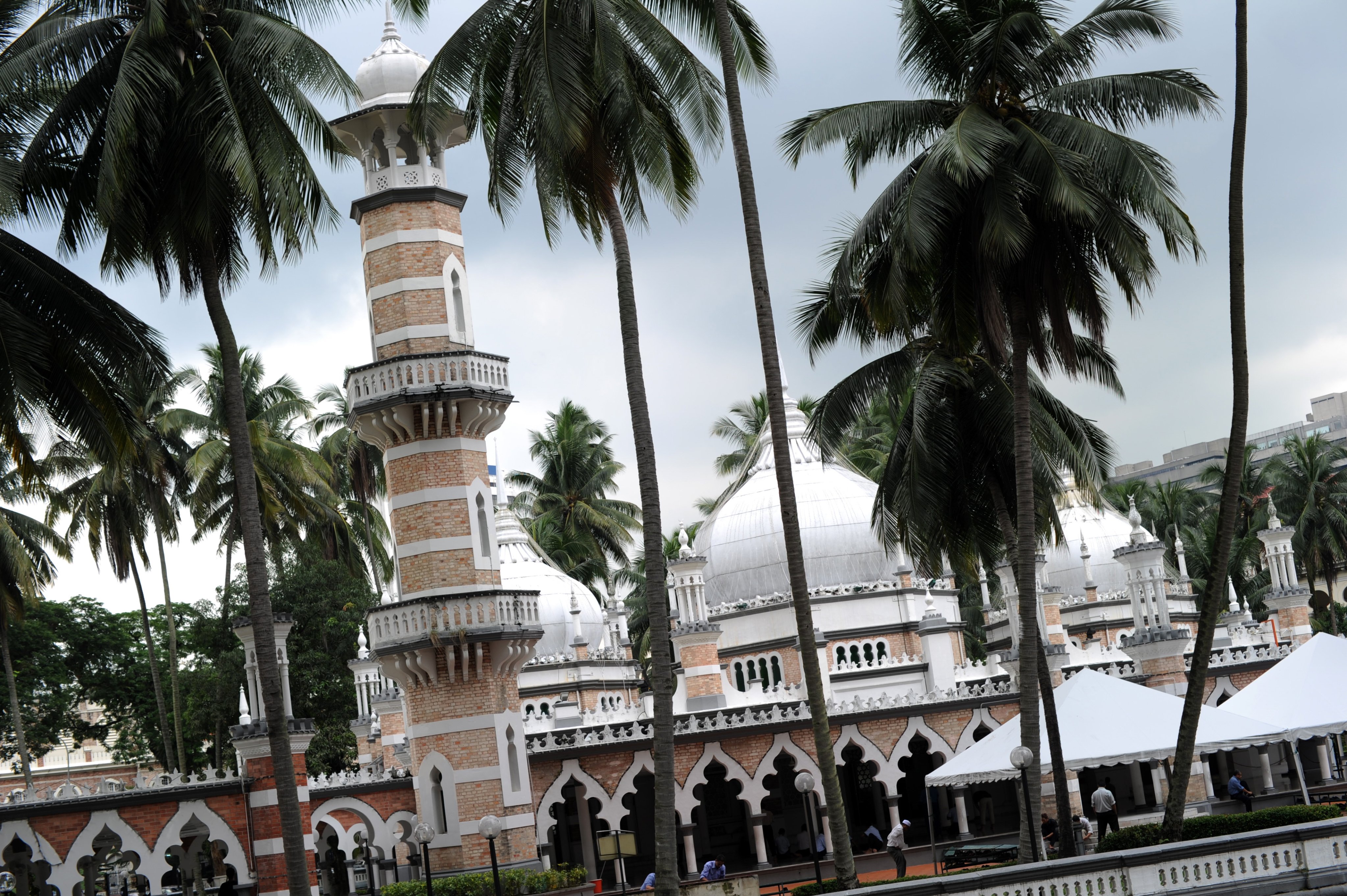 Muslims prepare to offer Friday prayers at the Jameh Masjid (mosque) in Kuala Lumpur. Malaysia operates parallel civil and sharia legal systems, with sharia law imposing an additional set of rules on Muslims. Photo: AFP