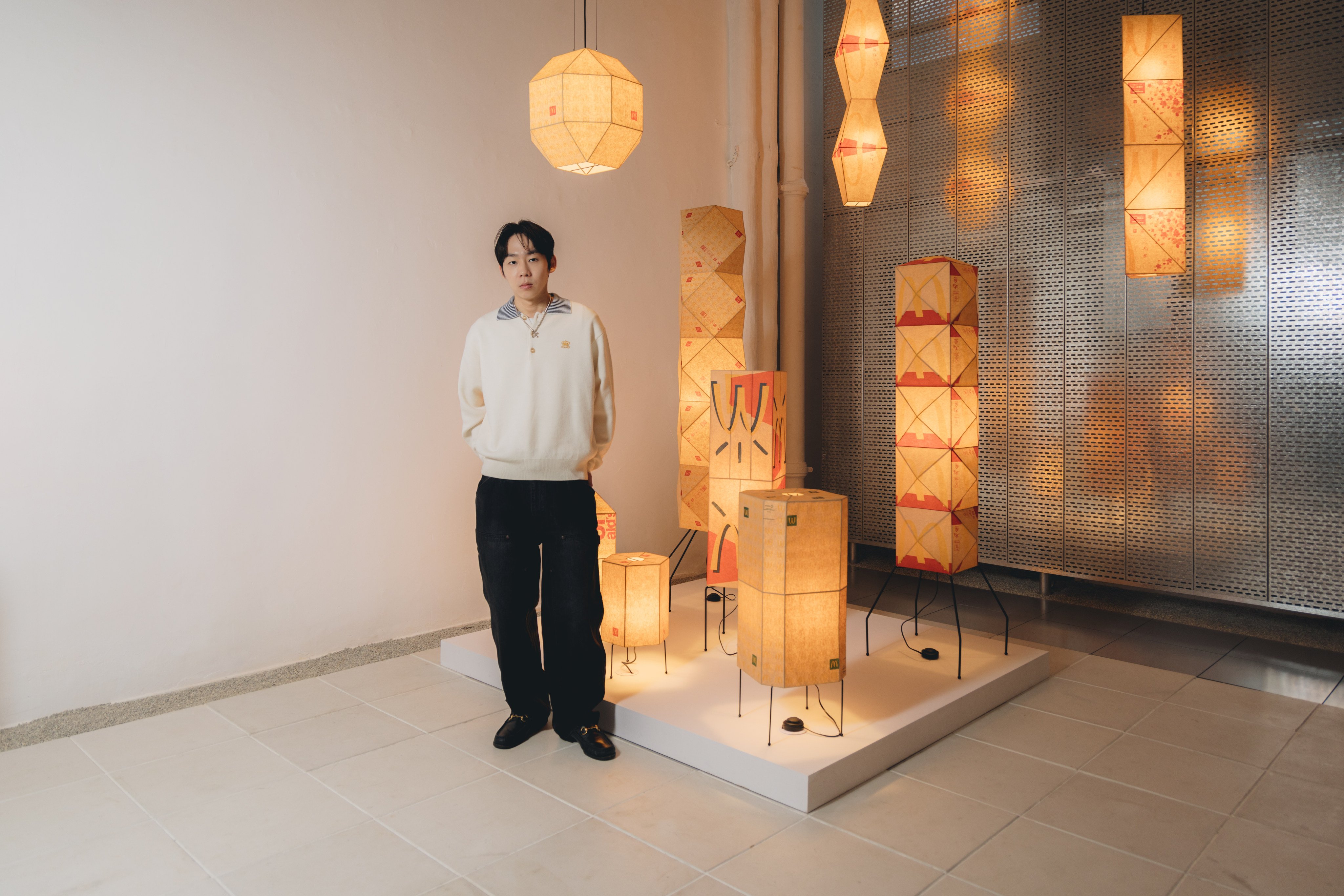 Korean artist Gyuhan Lee in front of an artwork as part of his solo exhibition, “Pop Craft Structure”, at WOAW Gallery in Hong Kong. Photo: Jocelyn Tam