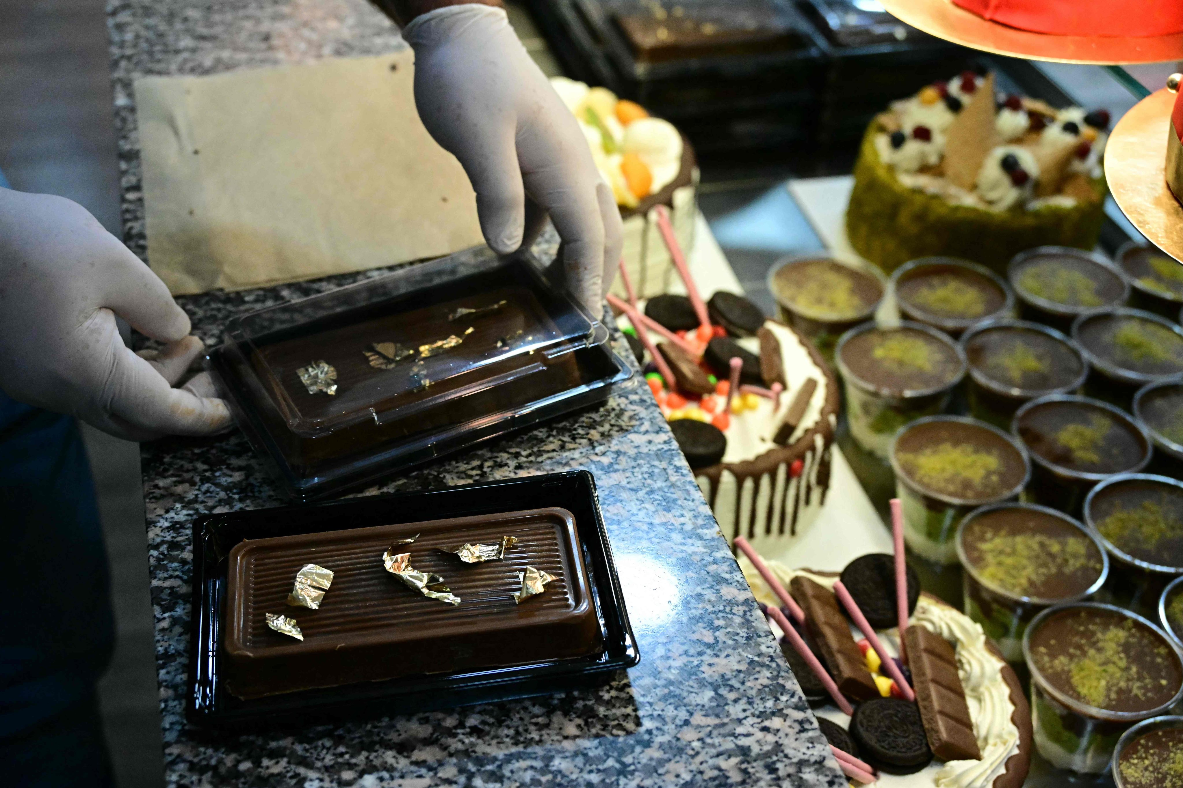 One Berlin bakery’s pistachio-filled chocolate bars were inspired by a viral treat from Dubai. photo: AFP