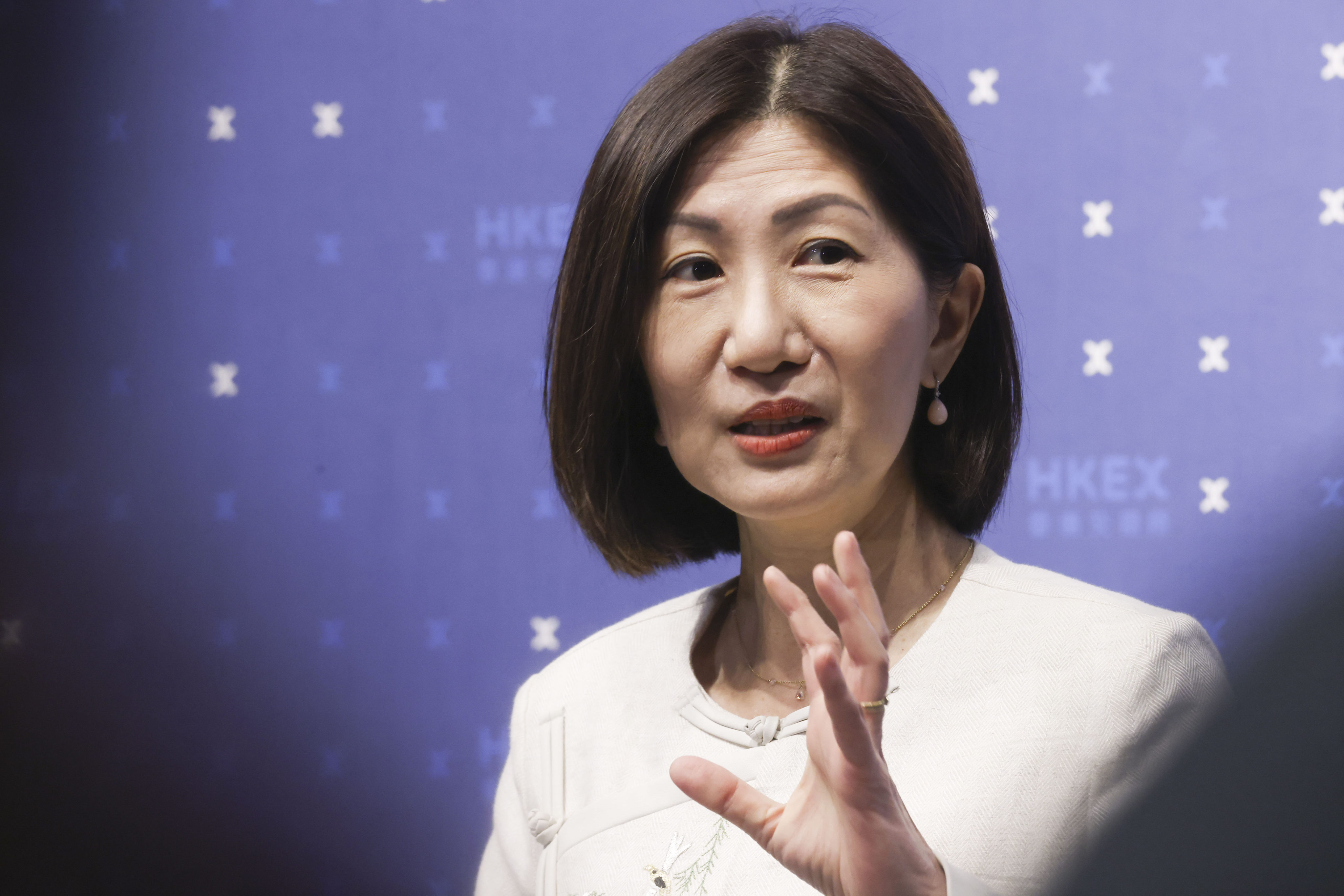 HKEX CEO Bonnie Chan Yiting said the exchange has received more than 100 listing applications this year, with many planning to raise at least US$1 billion or more. Photo: Jonathan Wong