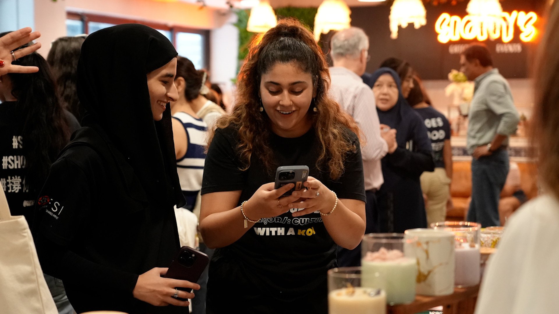 People interact at an event for small business owners from Hong Kong’s ethnic minority communities organised by the Foundation for Shared Impact in September. Photo: SCMP

