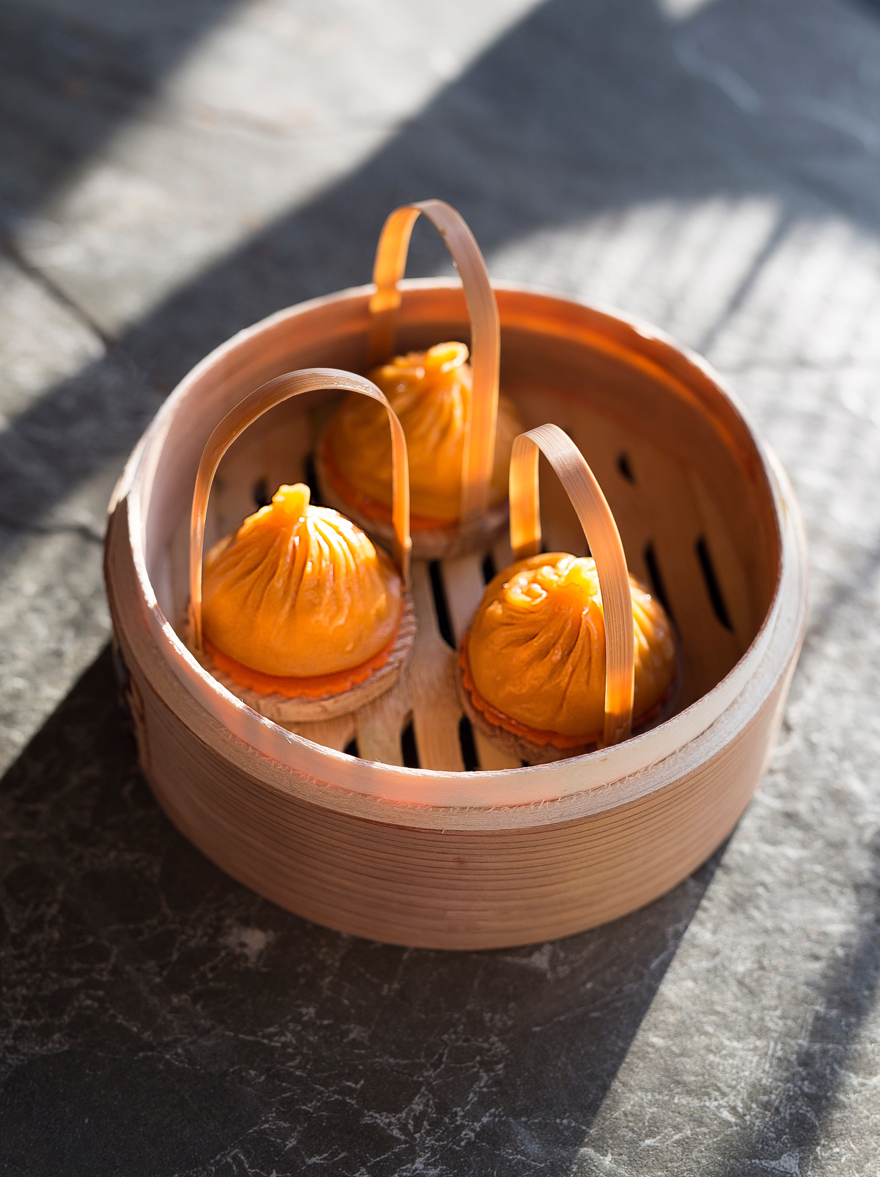 Chef Leung Kwok-wah has married two beloved dishes at Dim Sum Library, combining xiao long bao with the spicy broth from Hutong’s dan dan noodles. Photo: Handout