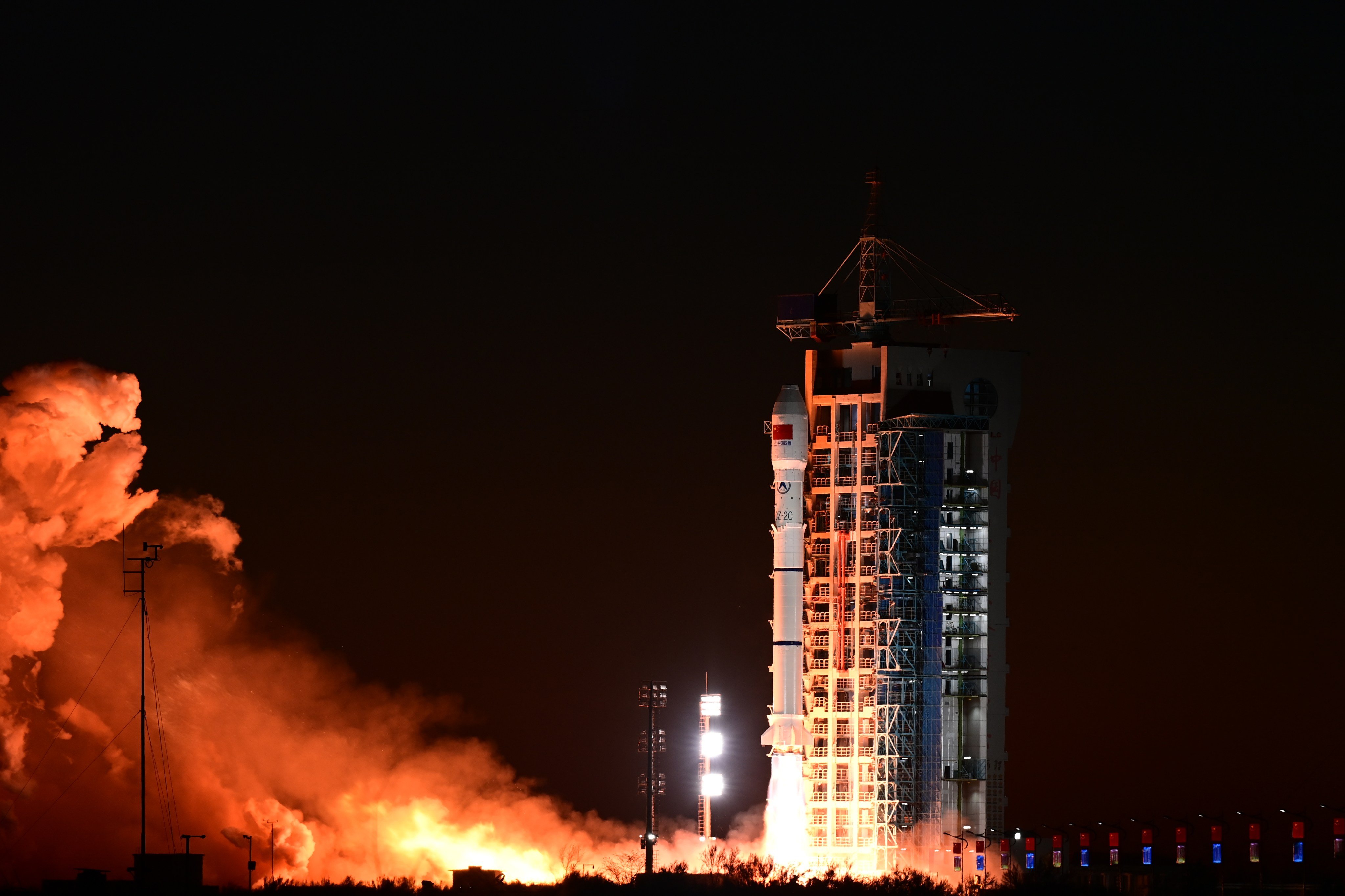 On Monday, a Long March-2C carrier rocket carrying two satellites blasts off from the Jiuquan Satellite Launch Centre to send Siwei Gaojing-2 03 and 04 into the preset orbit. Photo: Xinhua