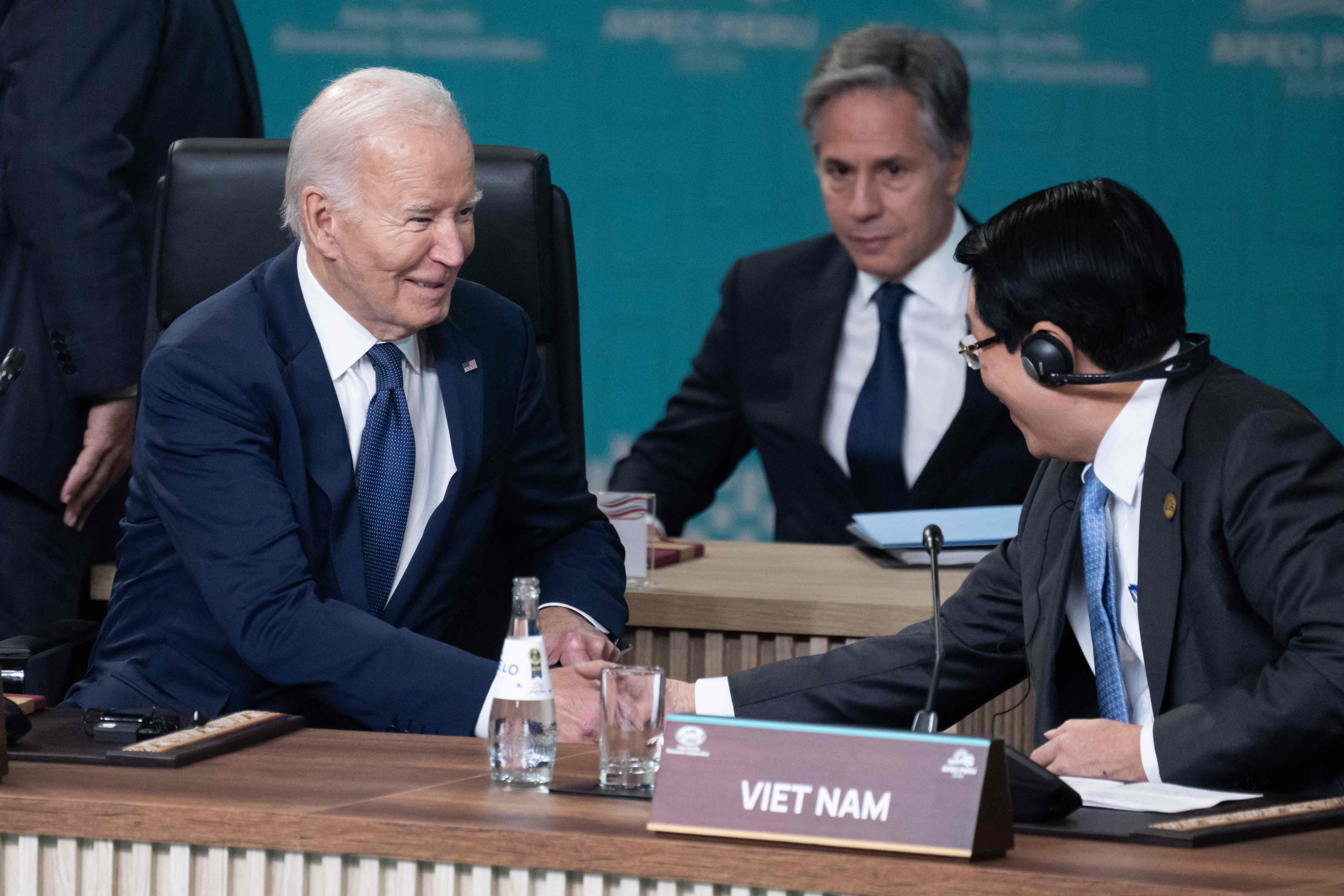 US President Joe Biden shakes hands with Vietnam’s President Luong Cuong at the APEC summit in Lima on November 15. Photo: AFP