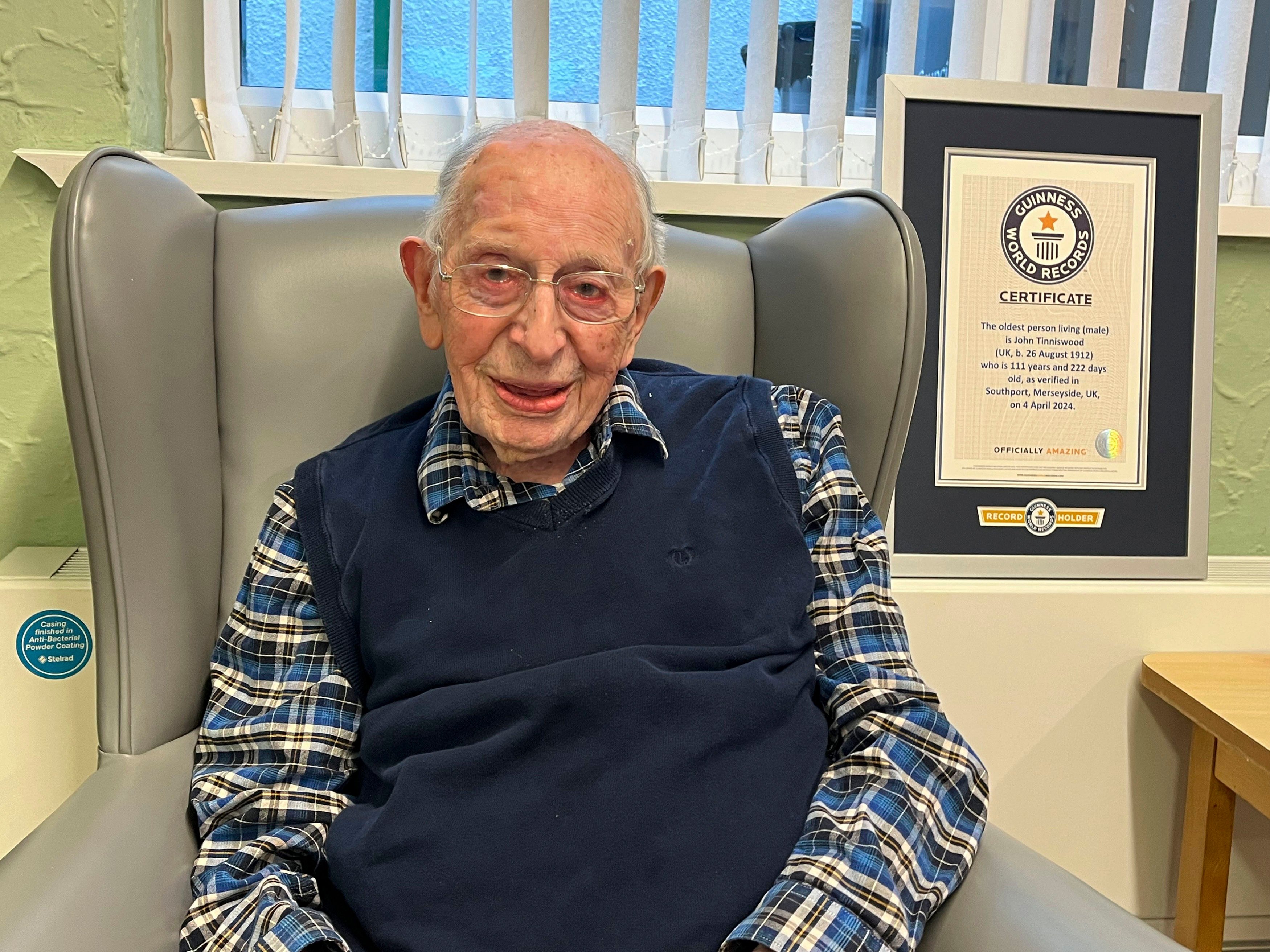 John Alfred Tinniswood, the world’s oldest man, said his secret to a long life is luck, regular exercise - and fish and chips every Friday. Photo: Guinness World Records/AP