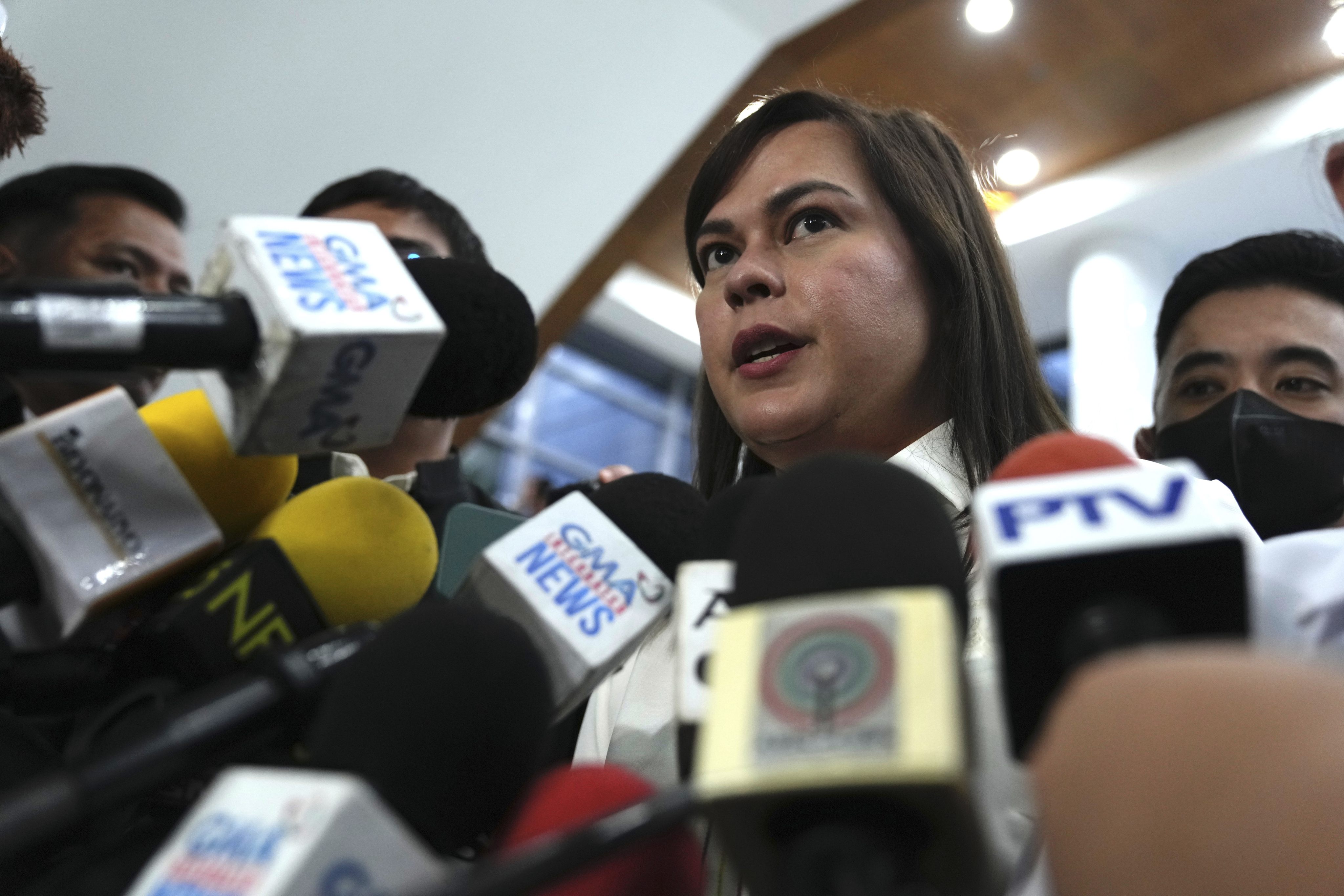 Philippine Vice-President Sara Duterte talks to reporters in Quezon City on Monday. Photo: AP