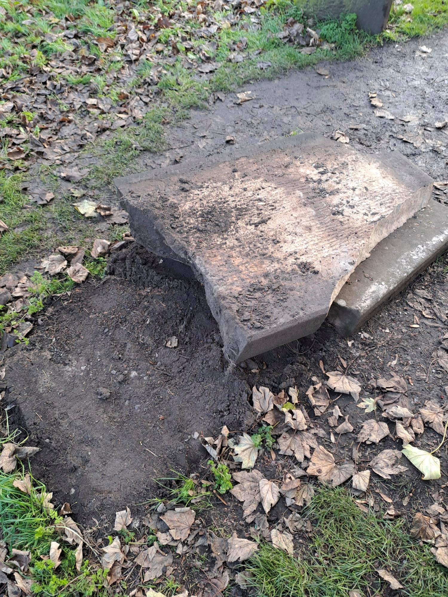 A smashed film set prop tombstone that was used for A Christmas Carol, in Shrewsbury, Shropshire, England. Photo: West Mercia Police via AP