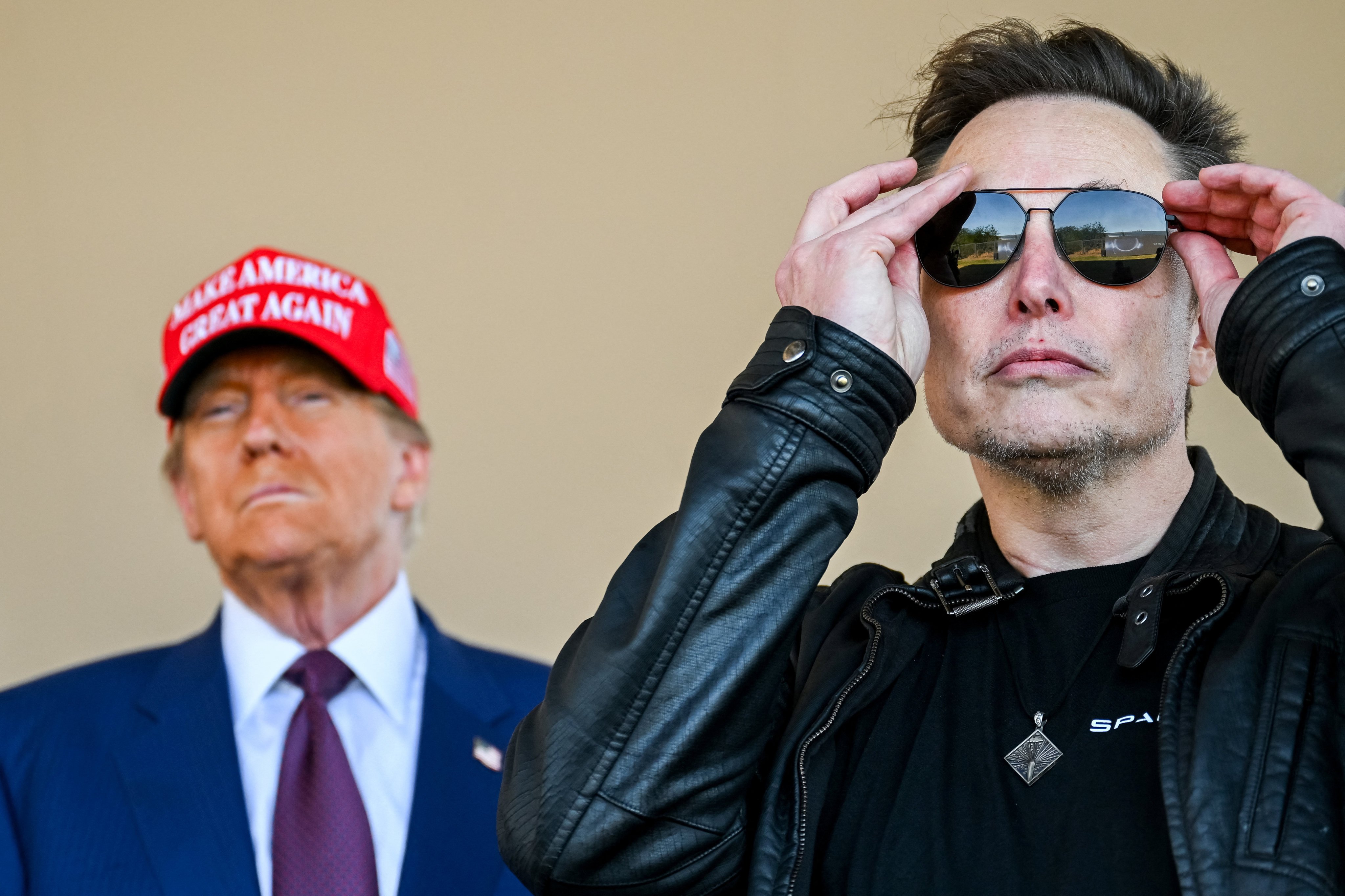 US president-elect Donald Trump and Elon Musk watch the launch of the sixth test flight of the SpaceX Starship rocket in Brownsville, Texas, November 19, 2024. Photo: Pool via Reuters