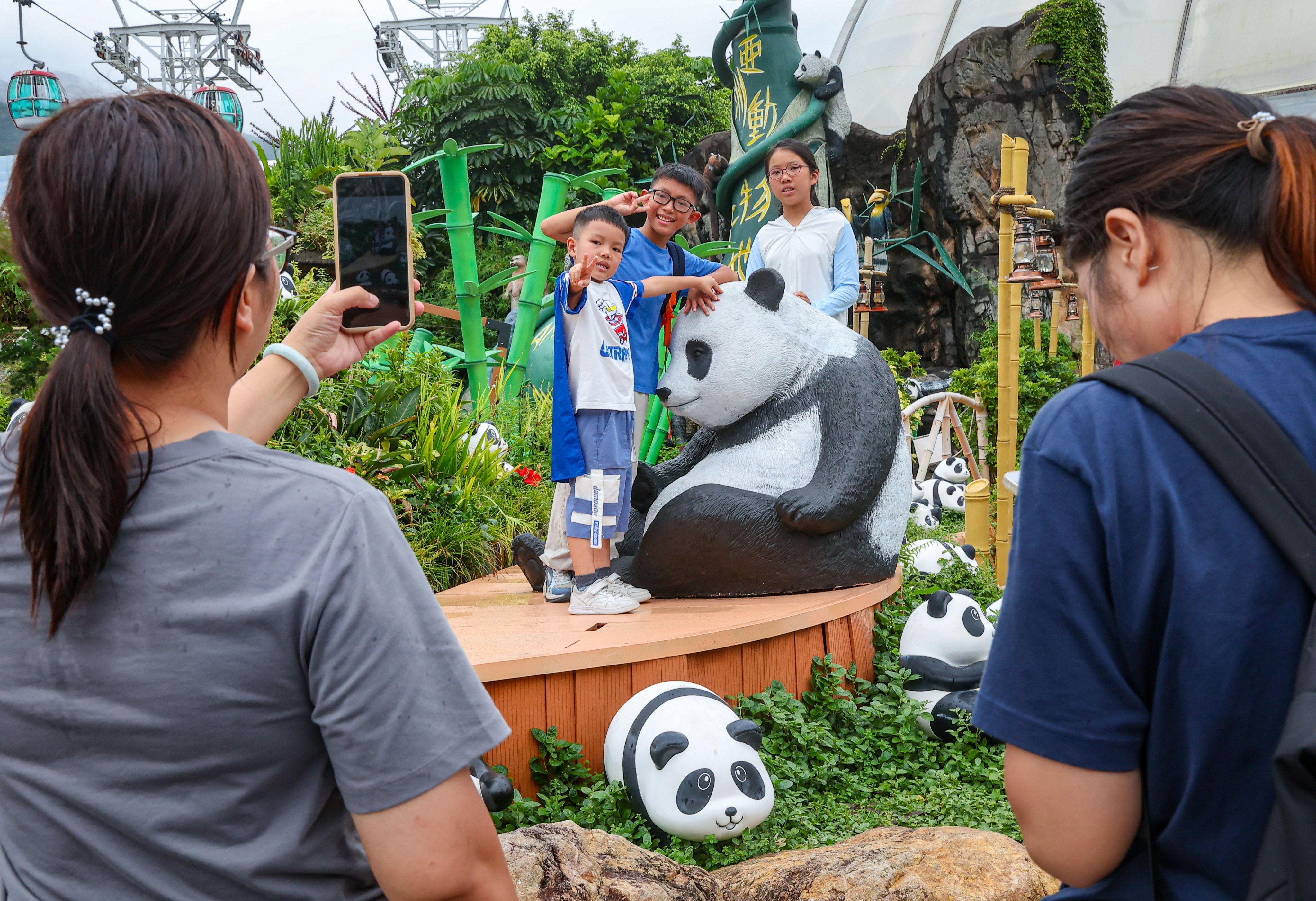 Tourists visit the “Giant Panda Adventure” at the Ocean Park. Photo: Edmond So