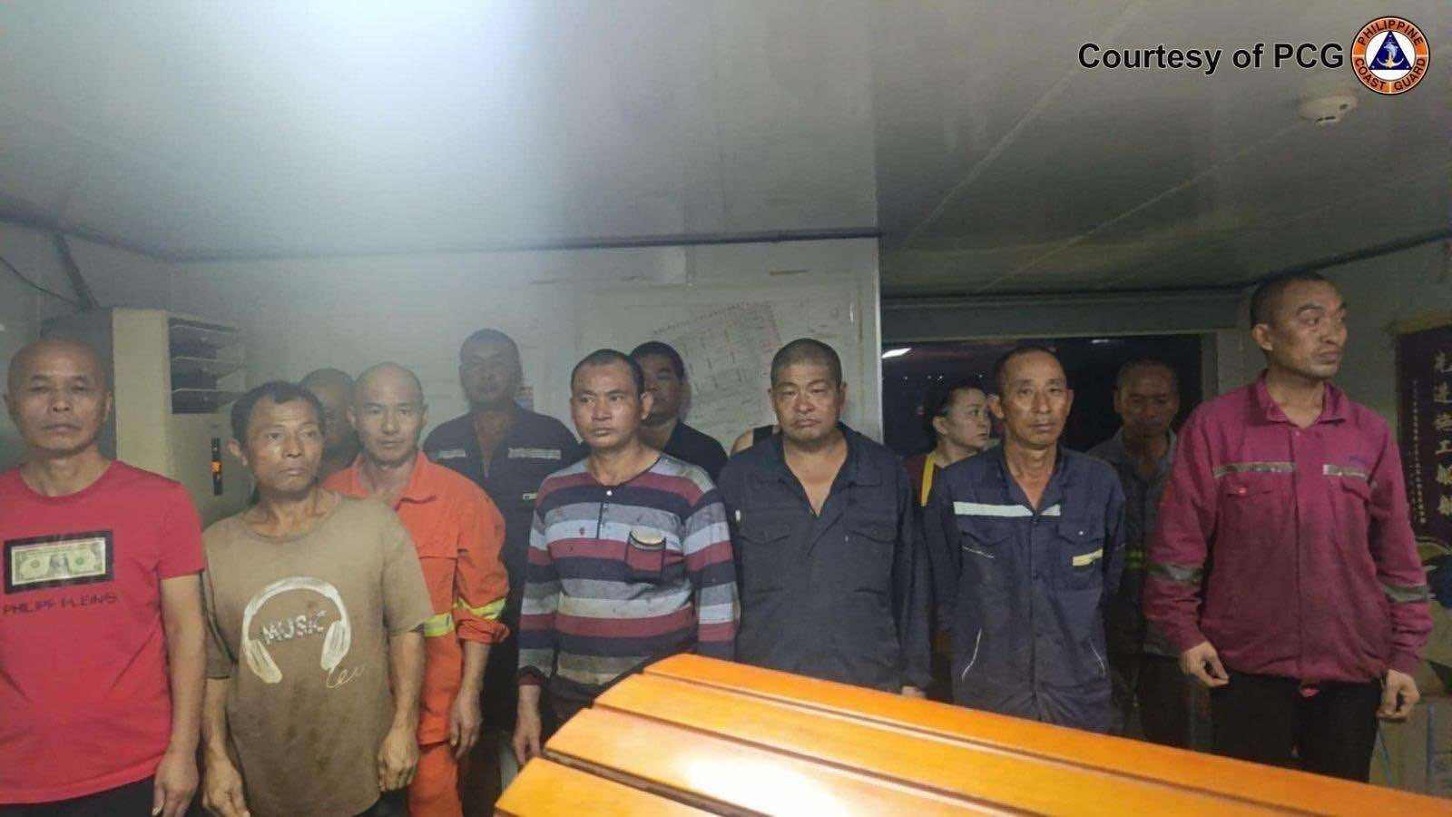 Undocumented Chinese nationals seen inside a dredger vessel on Tuesday off Bataan. Photo: Philippine coastguard